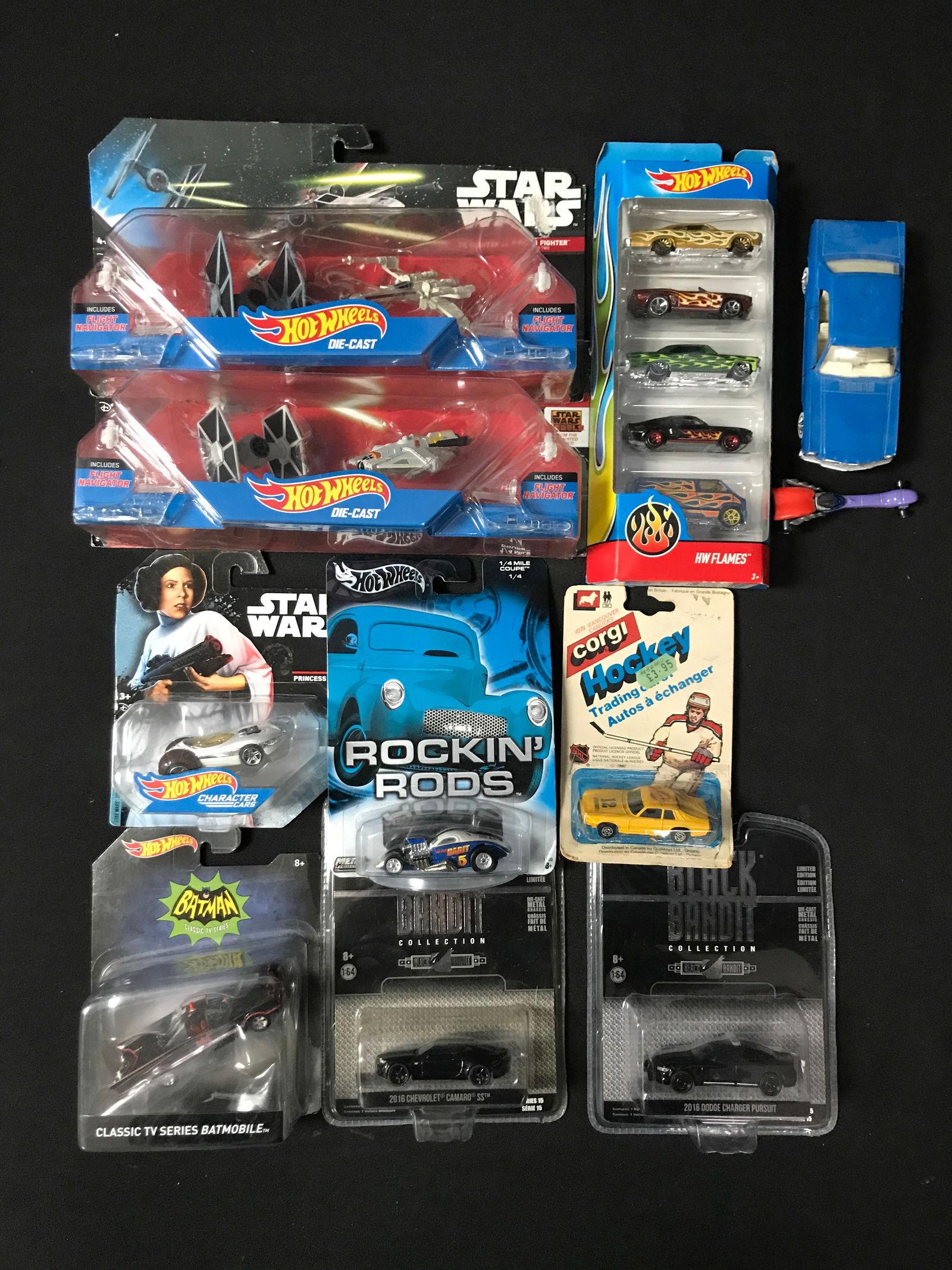 LOT OF MIXED HOT WHEELS VEHICLES IN ORIGINAL PACKAGING INCLUDING STAR WARS AND BATMAN: Prices are in Canadian dollars