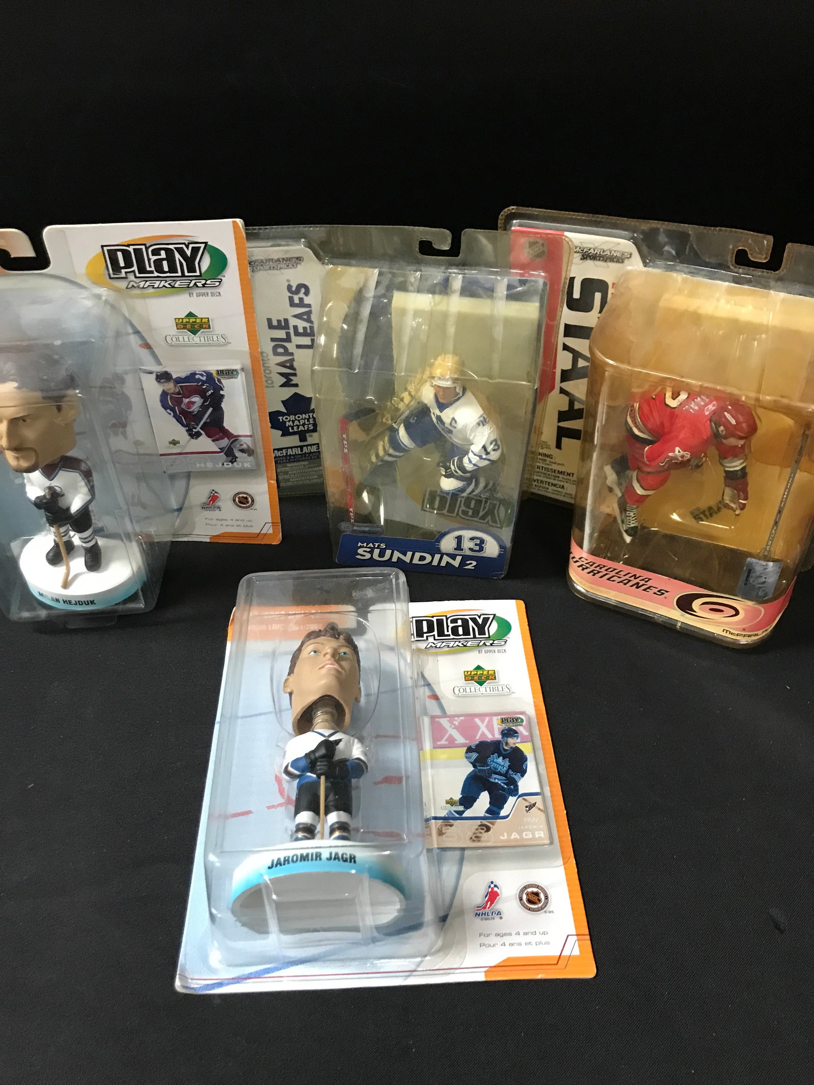 LOT OF 4 HOCKEY ACTION FIGURES / BOBBLE HEADS IN ORIIGINAL PACKAGING: Prices are in Canadian dollars