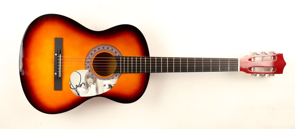 TAYLOR SWIFT SIGNED ACOUSTIC GUITAR - JSA COA: Prices are in Canadian dollars