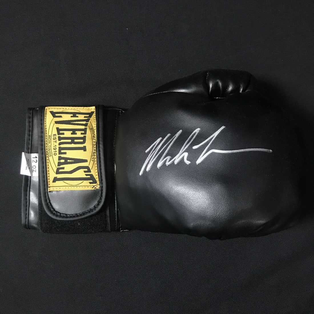 MIKE TYSON SIGNED BLACK EVERLAST BOXING GLOVE - WWOC COA: Prices are in Canadian dollars
