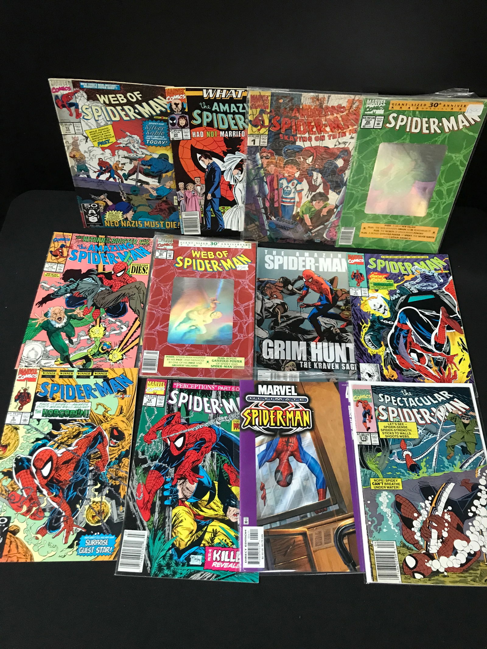 LOT OF 12 COMICS FEATURING SPIDERMAN - MARVEL COMICS (1 of 1)