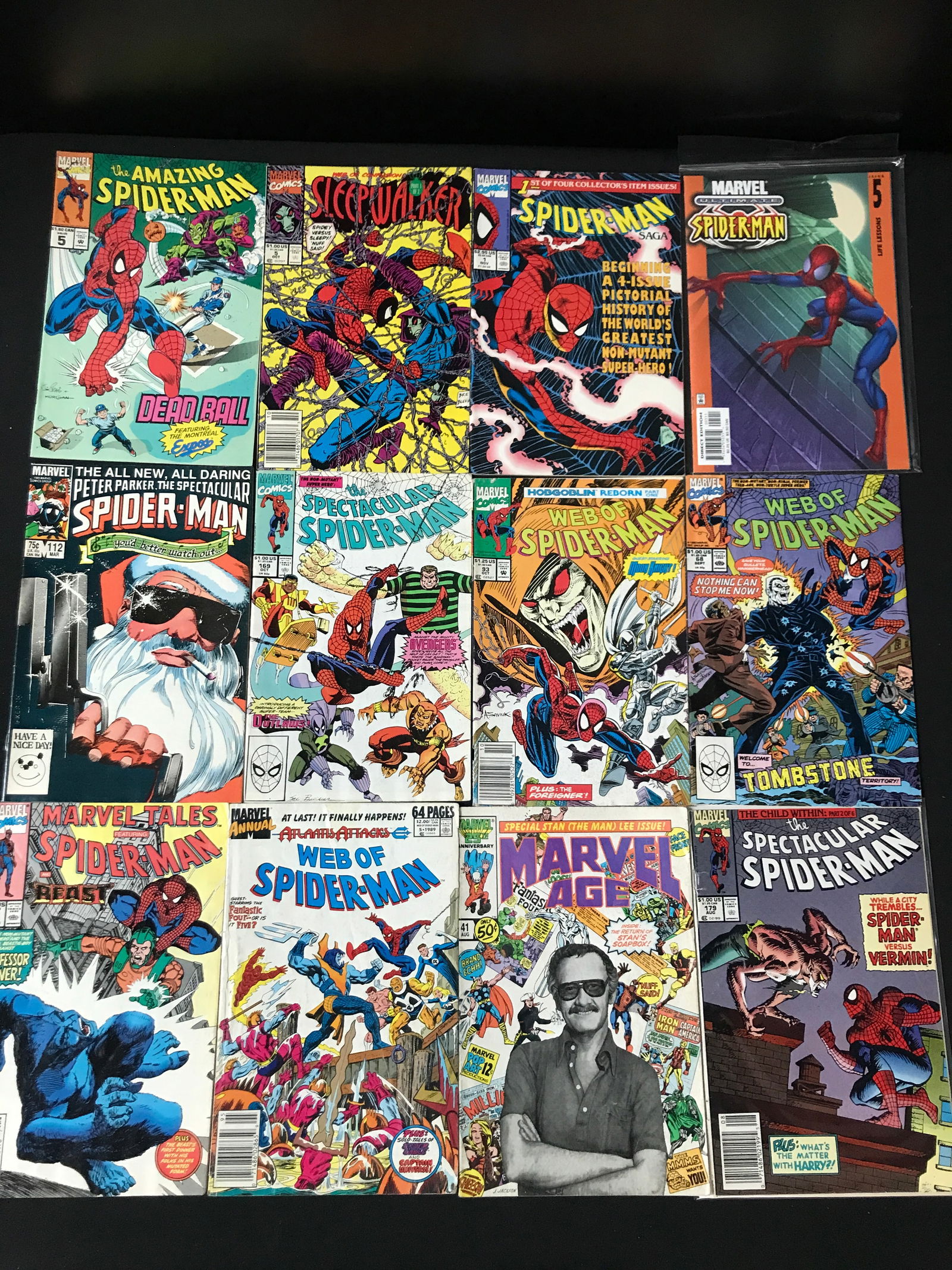 LOT OF 12 COMICS FEATURING SPIDERMAN - MARVEL COMICS (1 of 1)