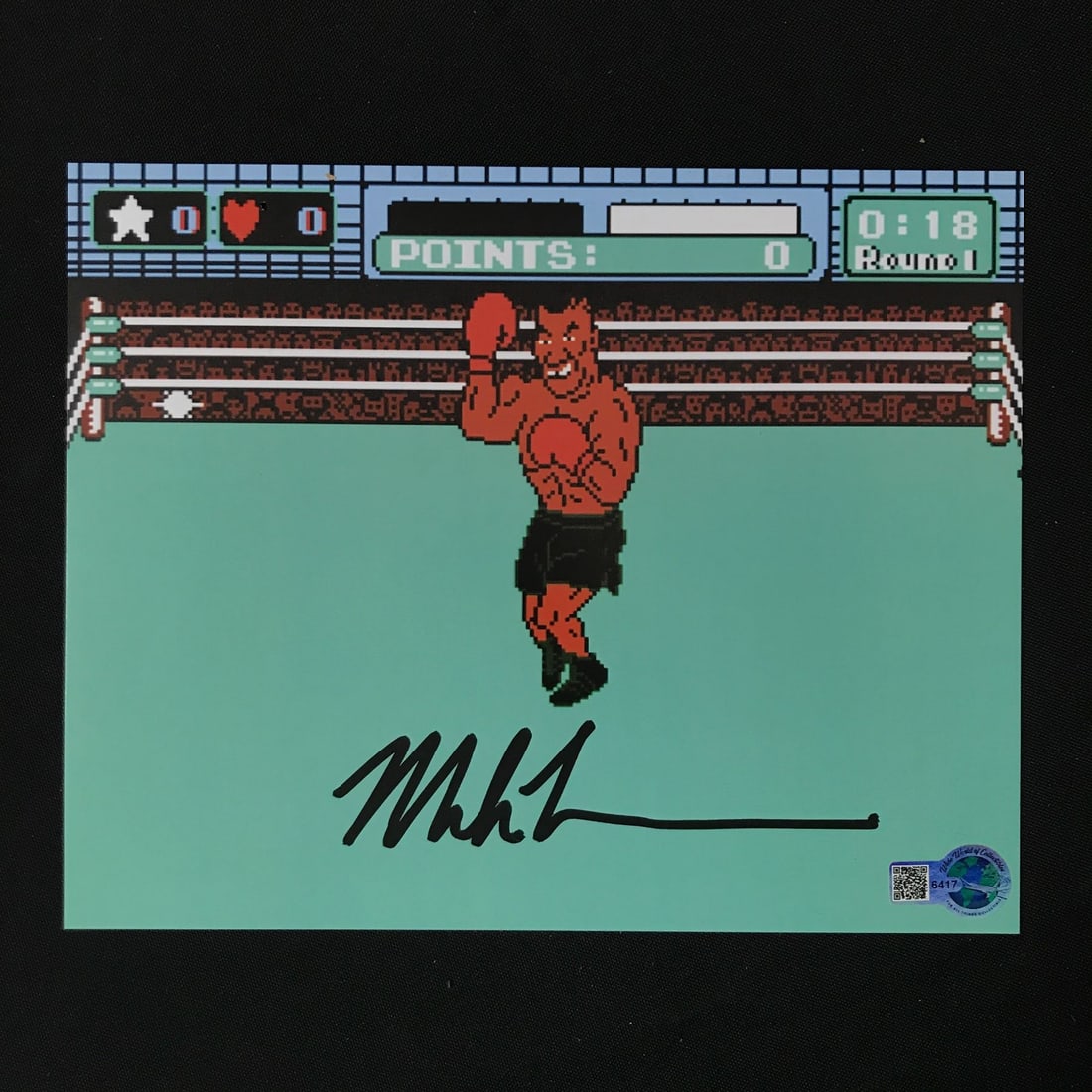 MIKE TYSON SIGNED PUNCH OUT 8 X 10 PICTURE - WWOC COA: Prices are in Canadian dollars