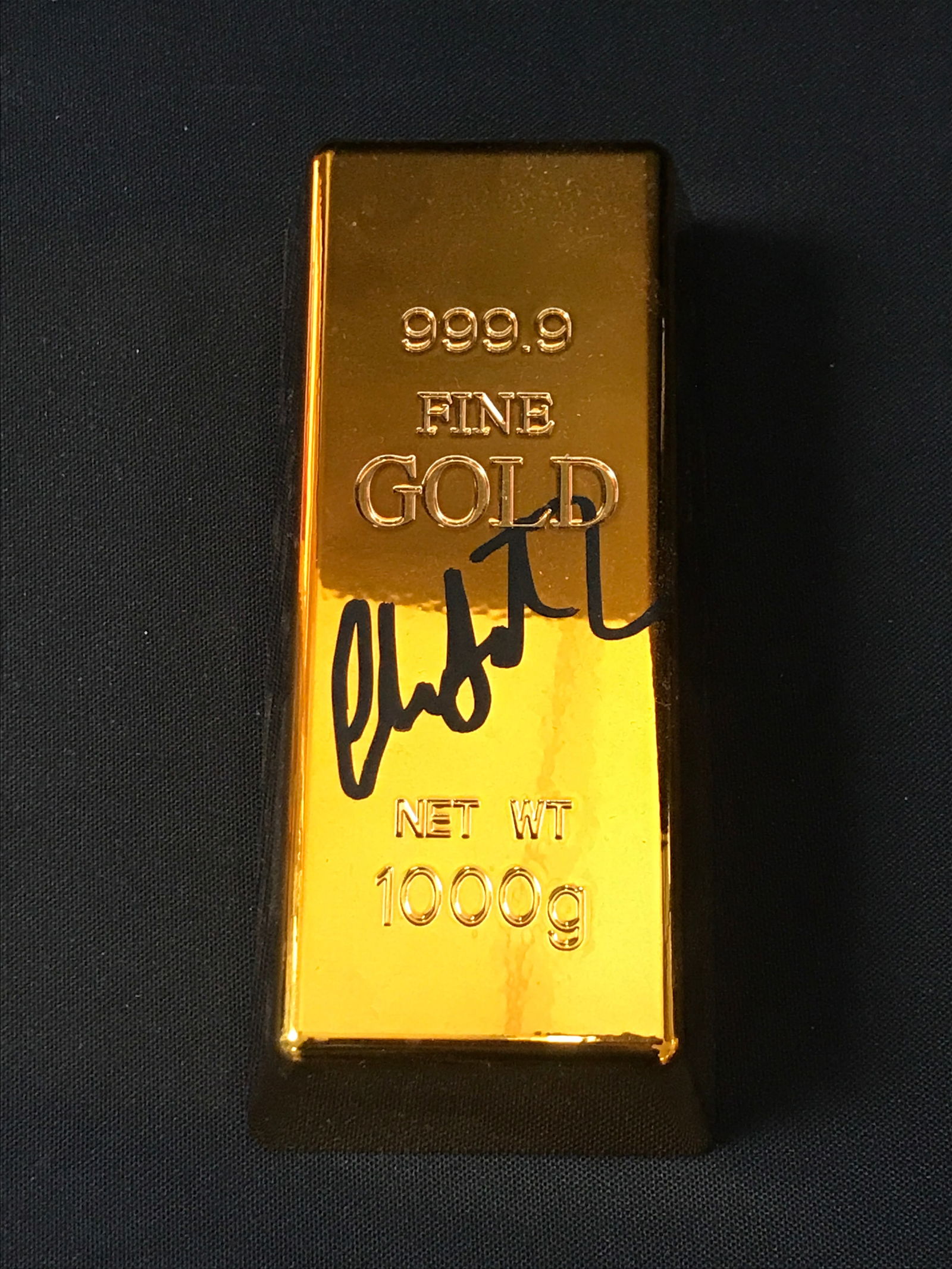 CHARLIZE THERON SIGNED PROP GOLD BAR - KB COA: Prices are in Canadian dollars