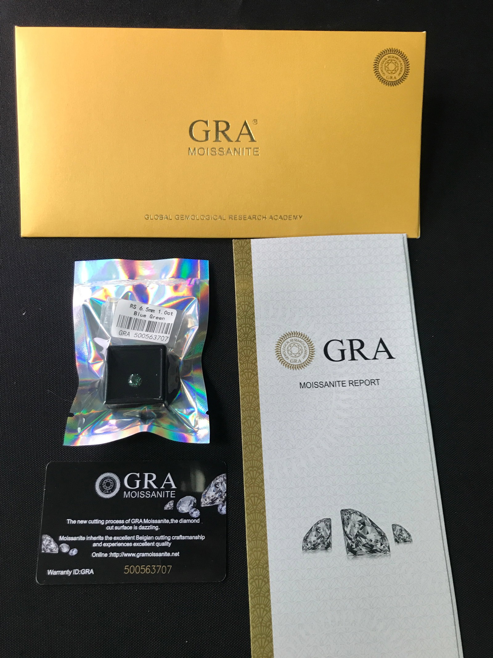 MOISSANITE 1 CARAT BLUE-GREEN COLOUR WITH GRA REPORT: Prices are in Canadian Dollars