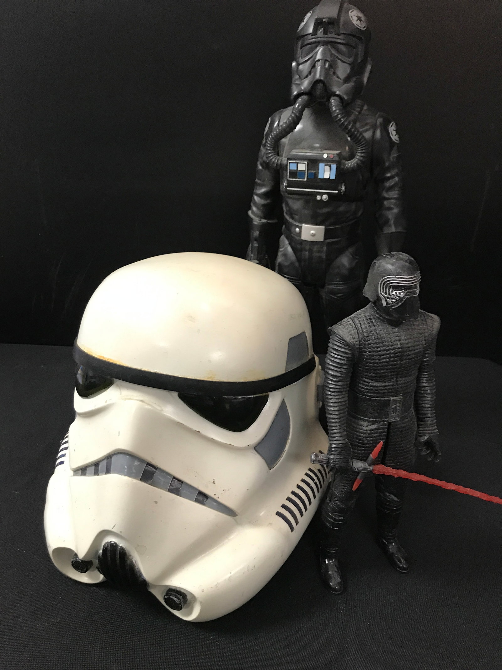 2 STAR WARS ACTION FIGURES AND A STORM TROOPER HELMET: Prices are in Canadian dollars