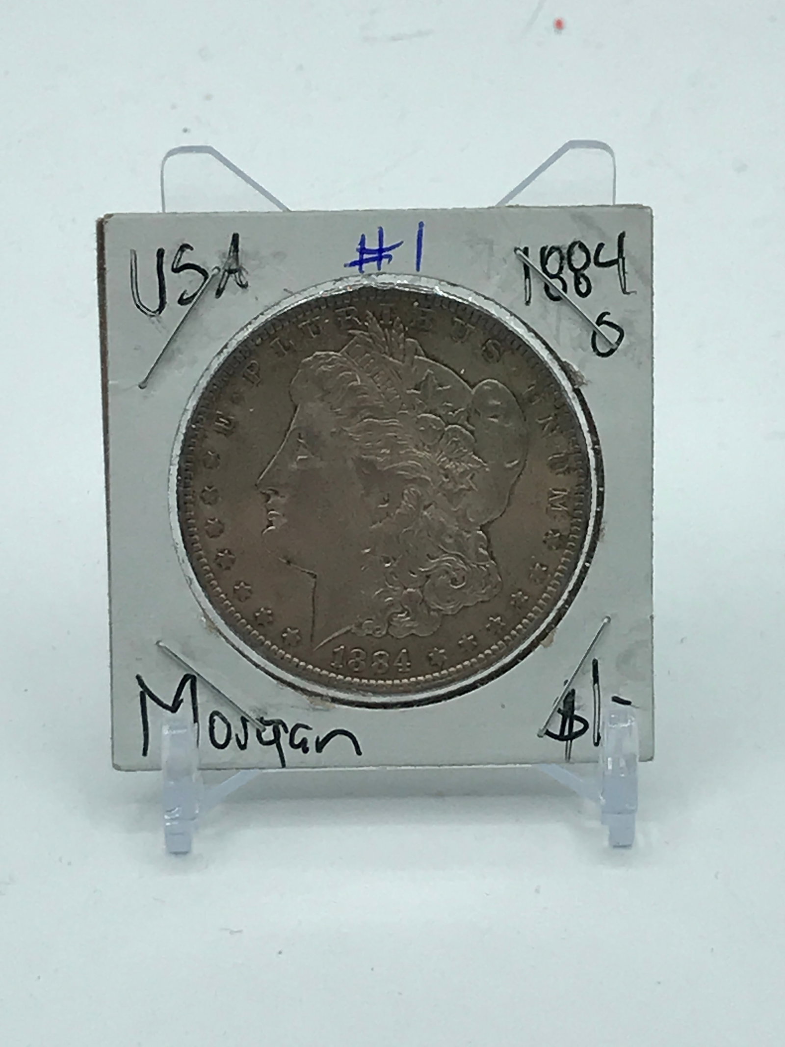 1884 MORGAN SILVER DOLLAR MINTED IN NEW ORLEANS: Prices are in Canadian dollars
