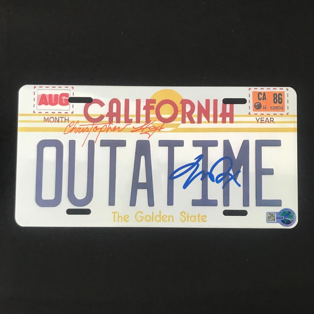 CHRISTOPHER LLOYD AND MICHAEL J FOX DUAL SIGNED OUTATIME LICENSE PLATE - WWOC COA: Prices are in Canadian dollars