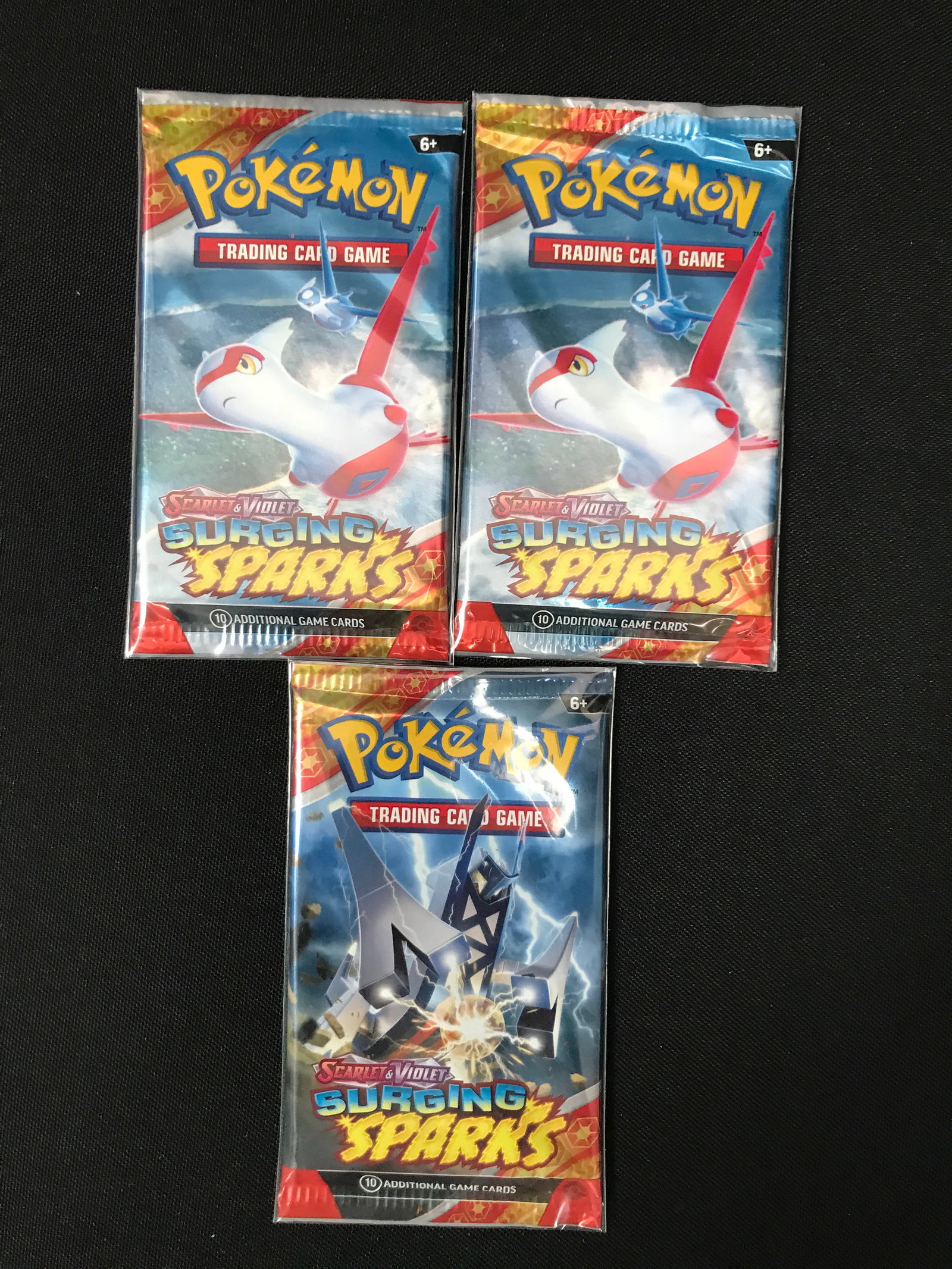 LOT OF 3 POKEMON TCG SCARLET & VIOLET SURGING SPARKS SEALED BOOSTER PACKS: Prices are in Canadian dollars