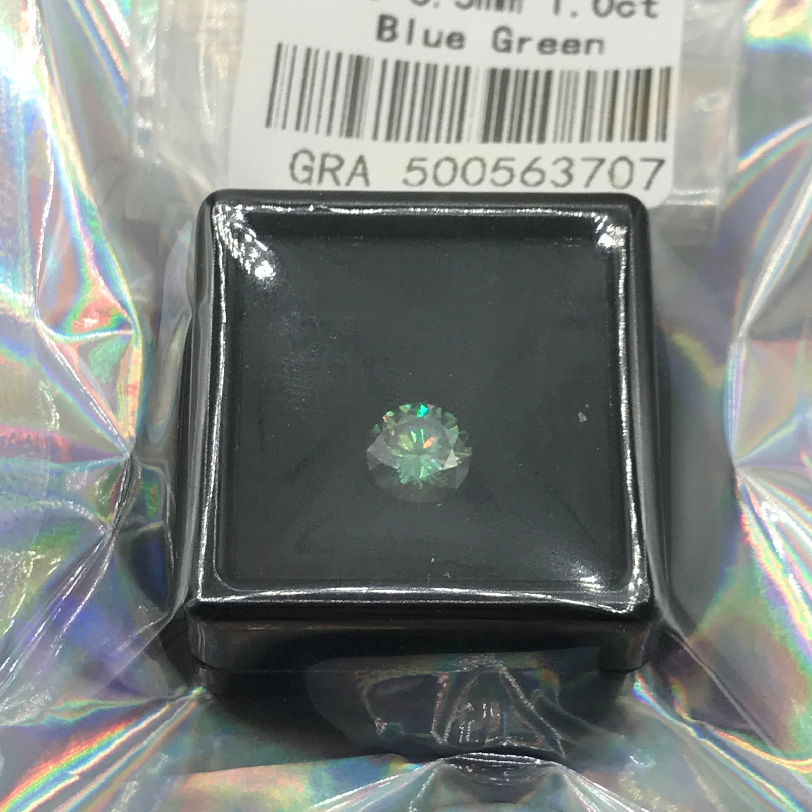 1 CT MOISSANITE ROUND BRILLIANT BLUE GREEN: Prices are in Canadian dollars