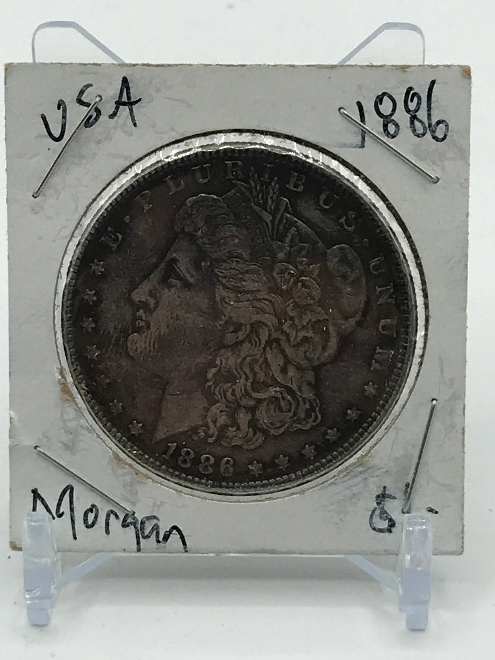 MORGAN SILVER DOLLAR - 1886: Prices are in Canadian dollars