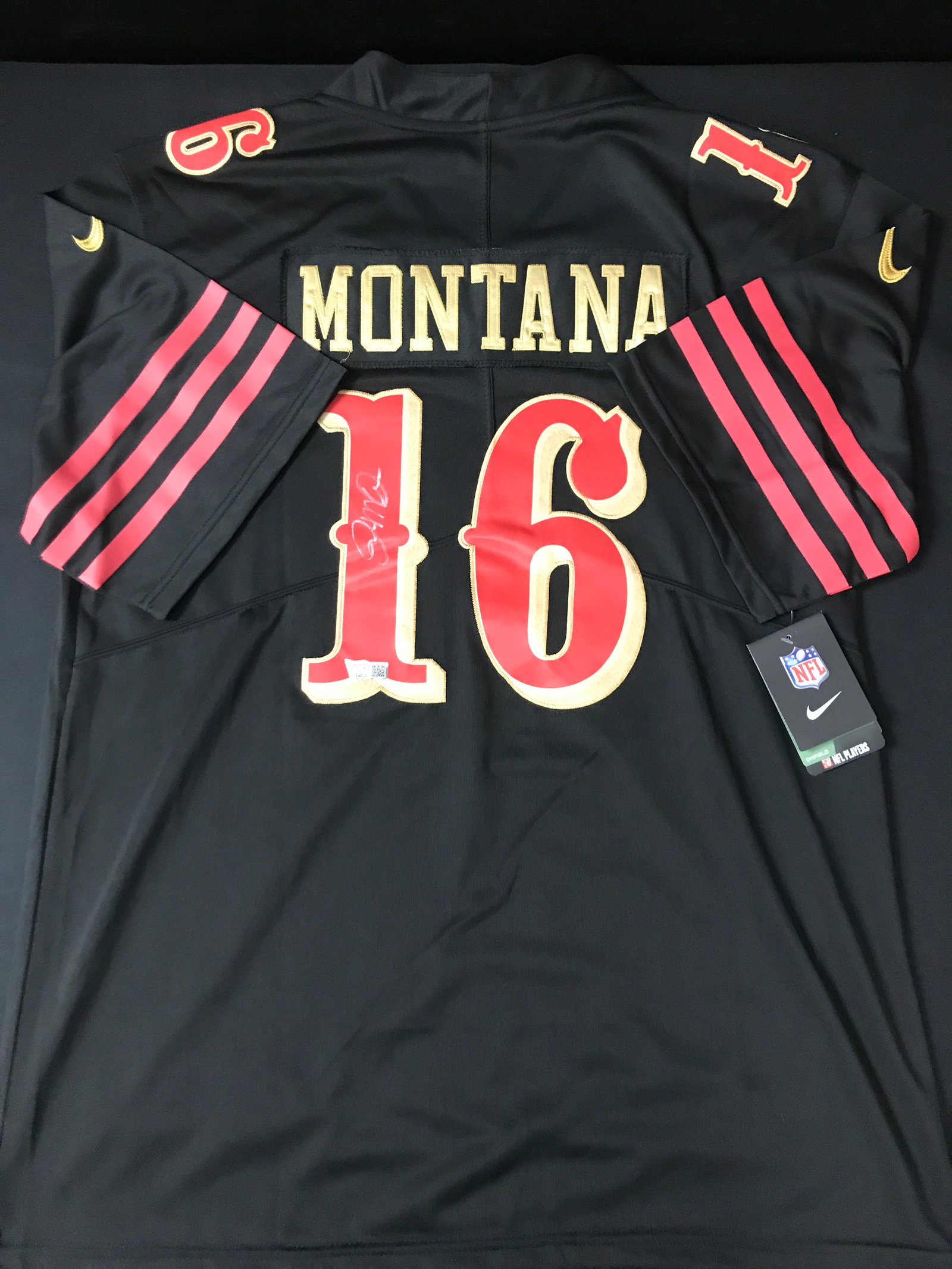 JOE MONTANA SIGNED CUSTOMS FOOTBALL JERSEY - ACE COA: Prices are in Canadian dollars