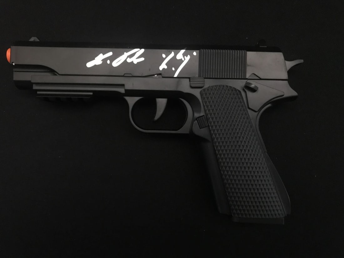 RON PEARLMAN SIGNED PROP GUN - WWOC COA: Prices are in Canadian dollars