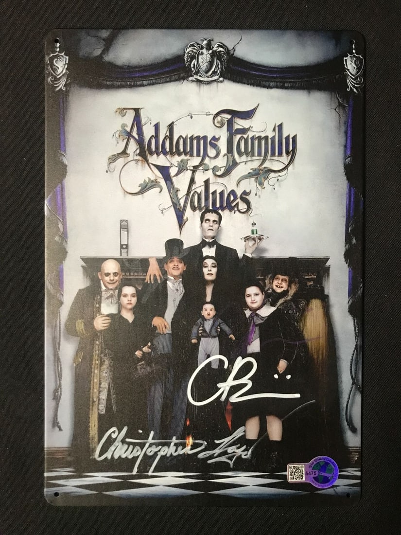 CHRISTOPHER LLOYD AND CHRISTINA RICCI DUAL SIGNED ADDAMS FAMILY TIN SIGN - WWOC COA: Prices are in Canadian dollars