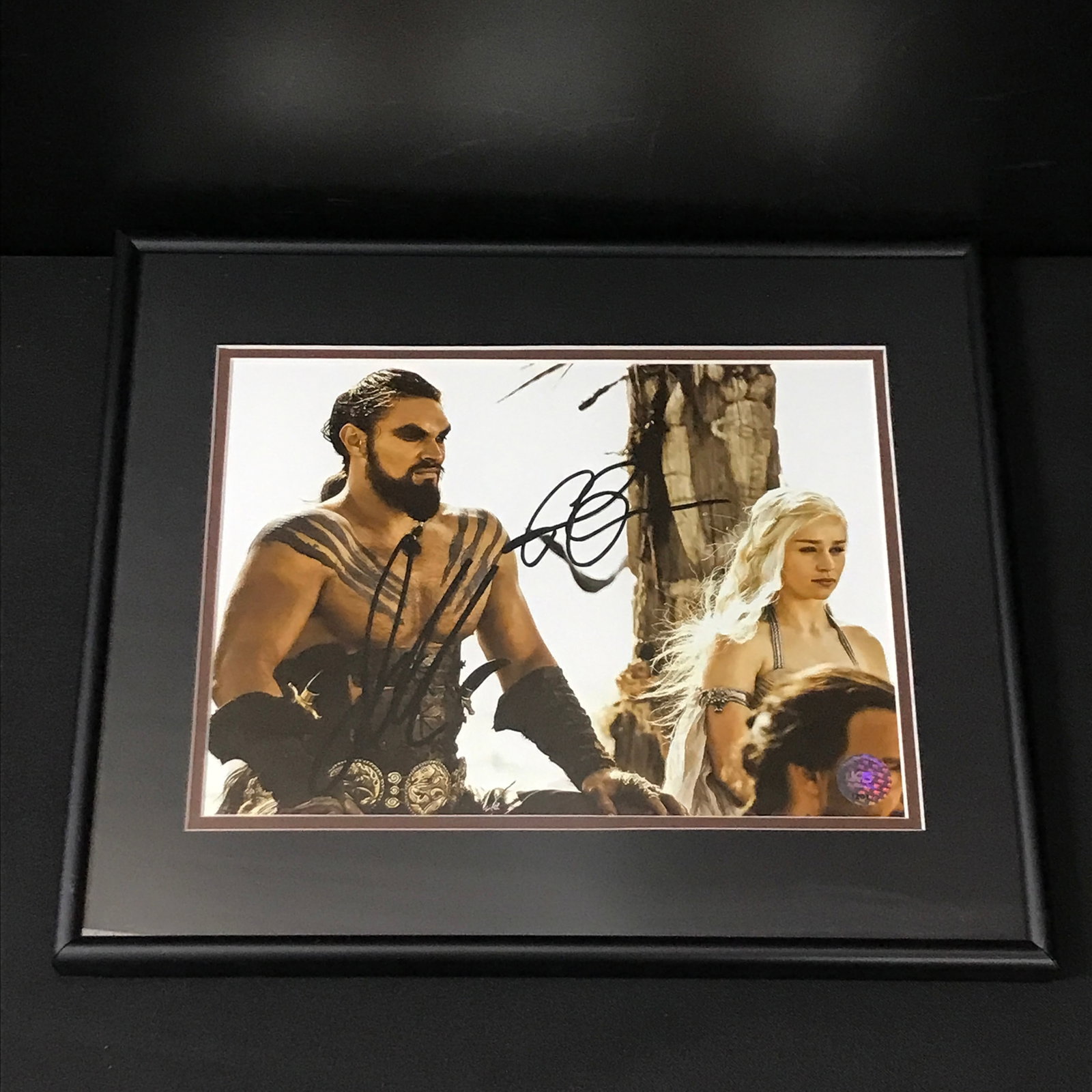 JASON MAMOA AND EMILIA CLARKE DUAL SIGNED AND FRAMED 8X10 - WWOC COA: Prices are in Canadian dollars
