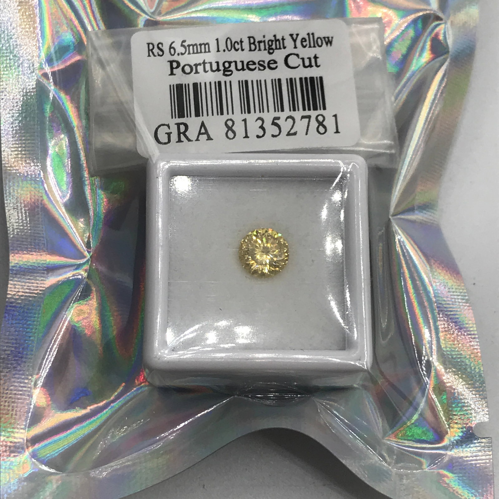 1 CARAT BRIGHT YELLOW PORTUGESE CUT MOISSANITE - GRA REPORT: Prices are in Canadian dollars
