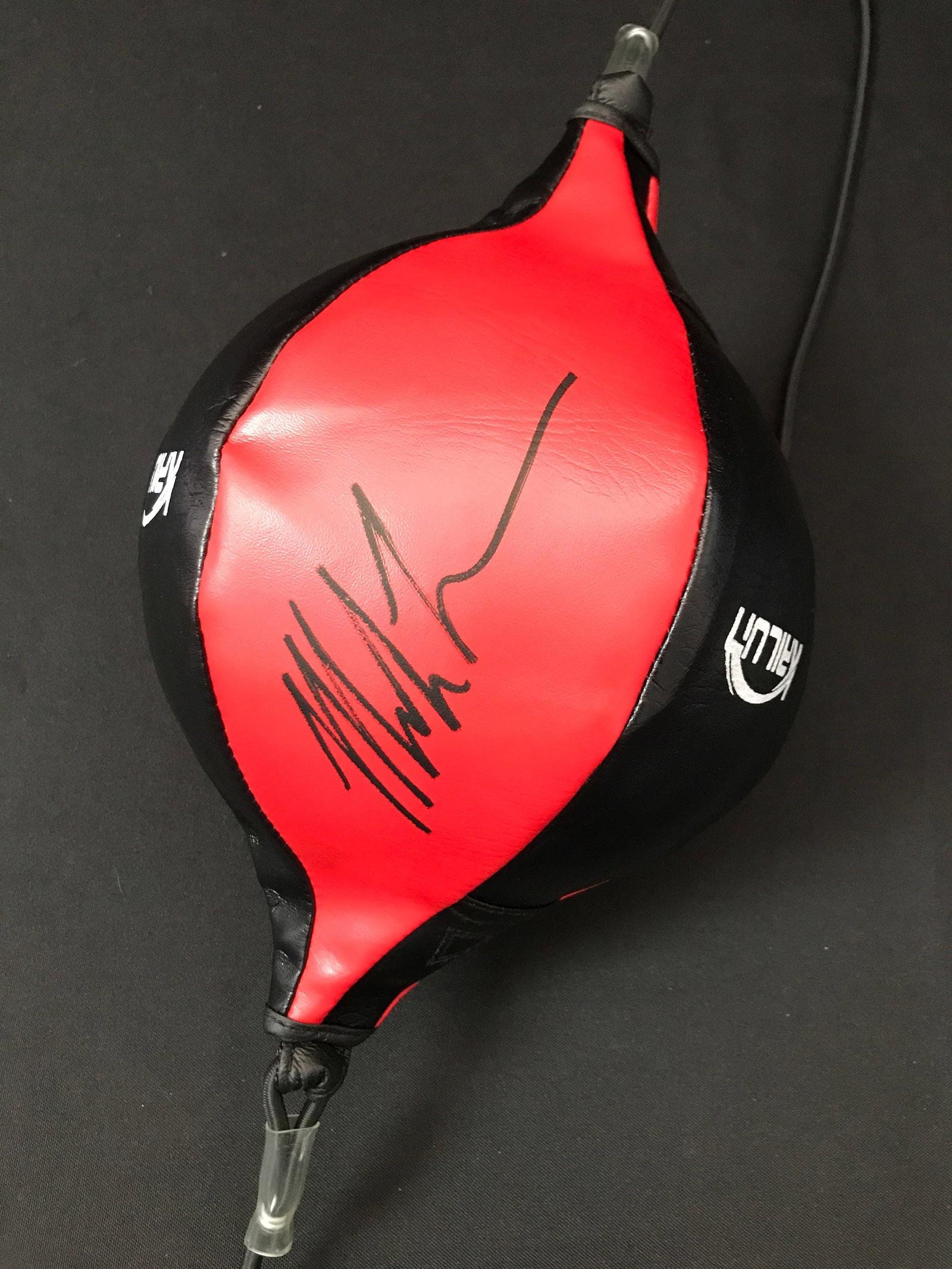 MIKE TYSON SIGNED SPEED PUNCHING BAG - WWOC COA: Prices are in Canadian dollars