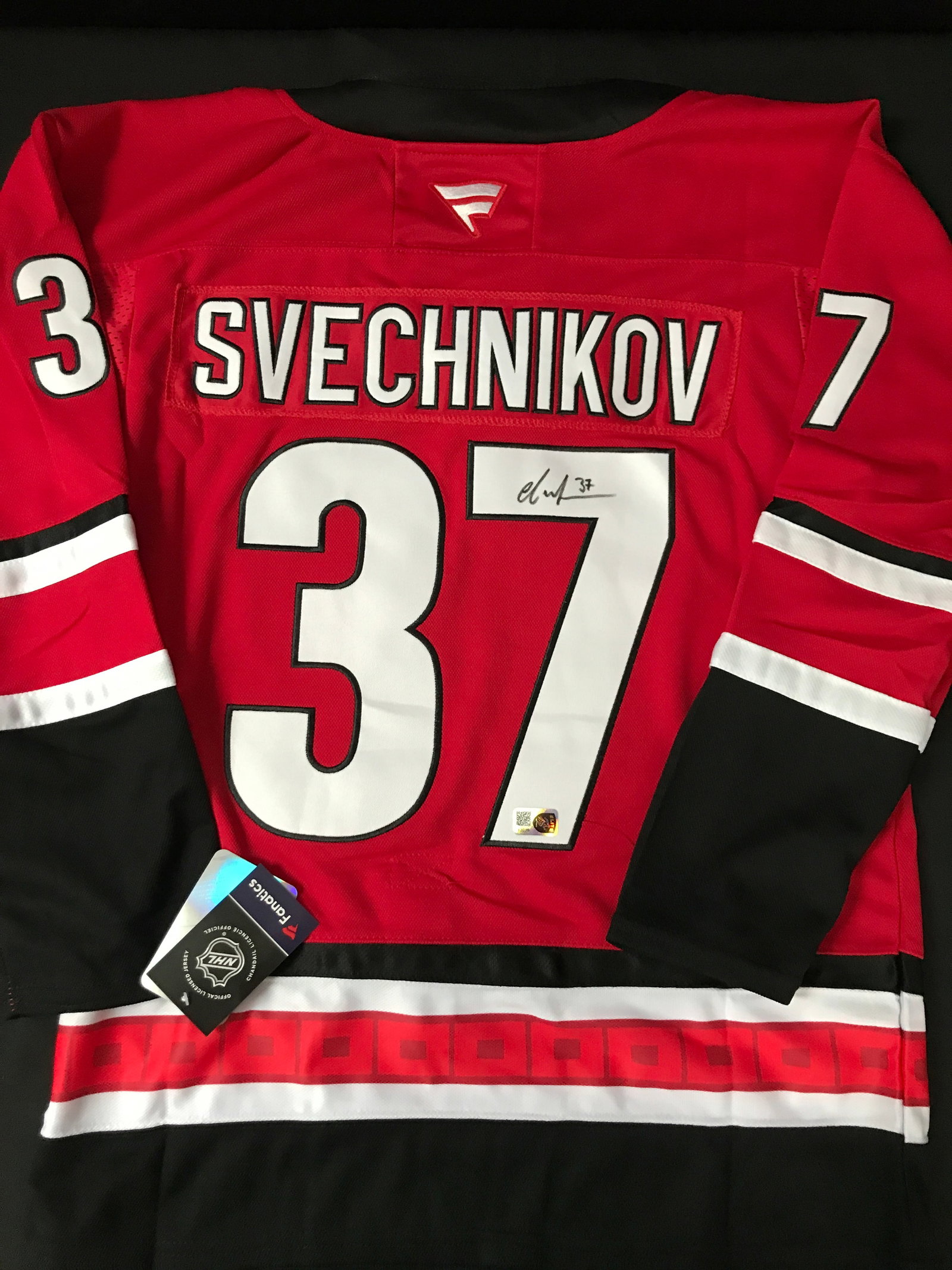 ANDREI SVECHNIKOV SIGNED CAROLINA HURRIANCES CUSTOM JERSEY - ELITE SPORTS COA: Prices are in Canadian dollars
