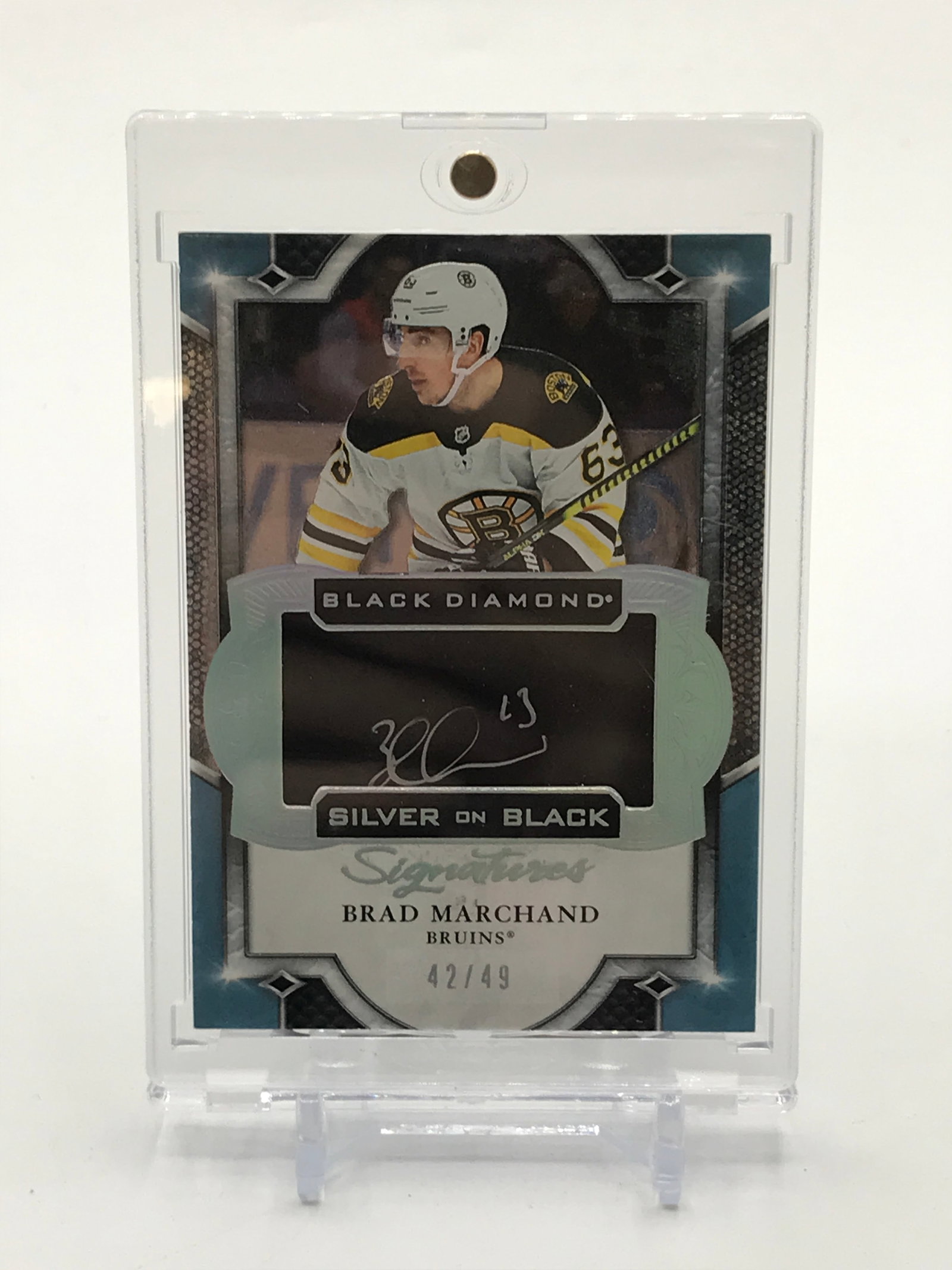 2019-20 UPPER DECK BLACK DIAMOND HOCKEY SILVER ON BLACK BRAD MARCHAND SIGNED TRADING CARD 42/49: Prices are in Canadian dollars