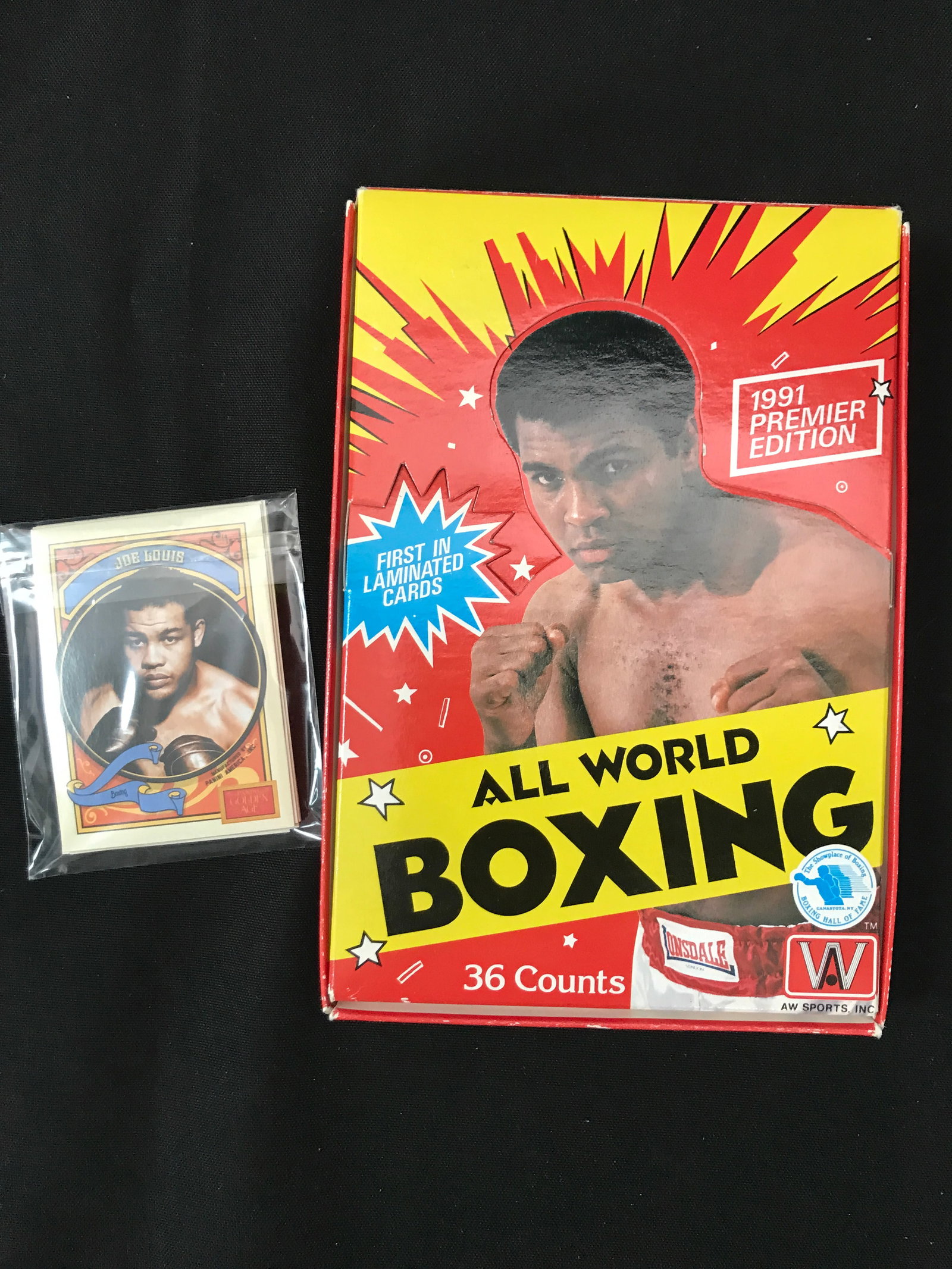 1991 AW SPORTS INC PREMIER EDITION BOXING TRADING CARD BOX AND JOE LOUIS TRADING CARD IN SLEEVE: Prices are in Canadian dollars