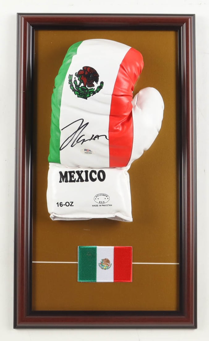 JULIO CESAR CHAVEZ SIGNED AND FRAMED MEXICAN BOXING GLOVE - PSA COA: Prices are in Canadian dollars