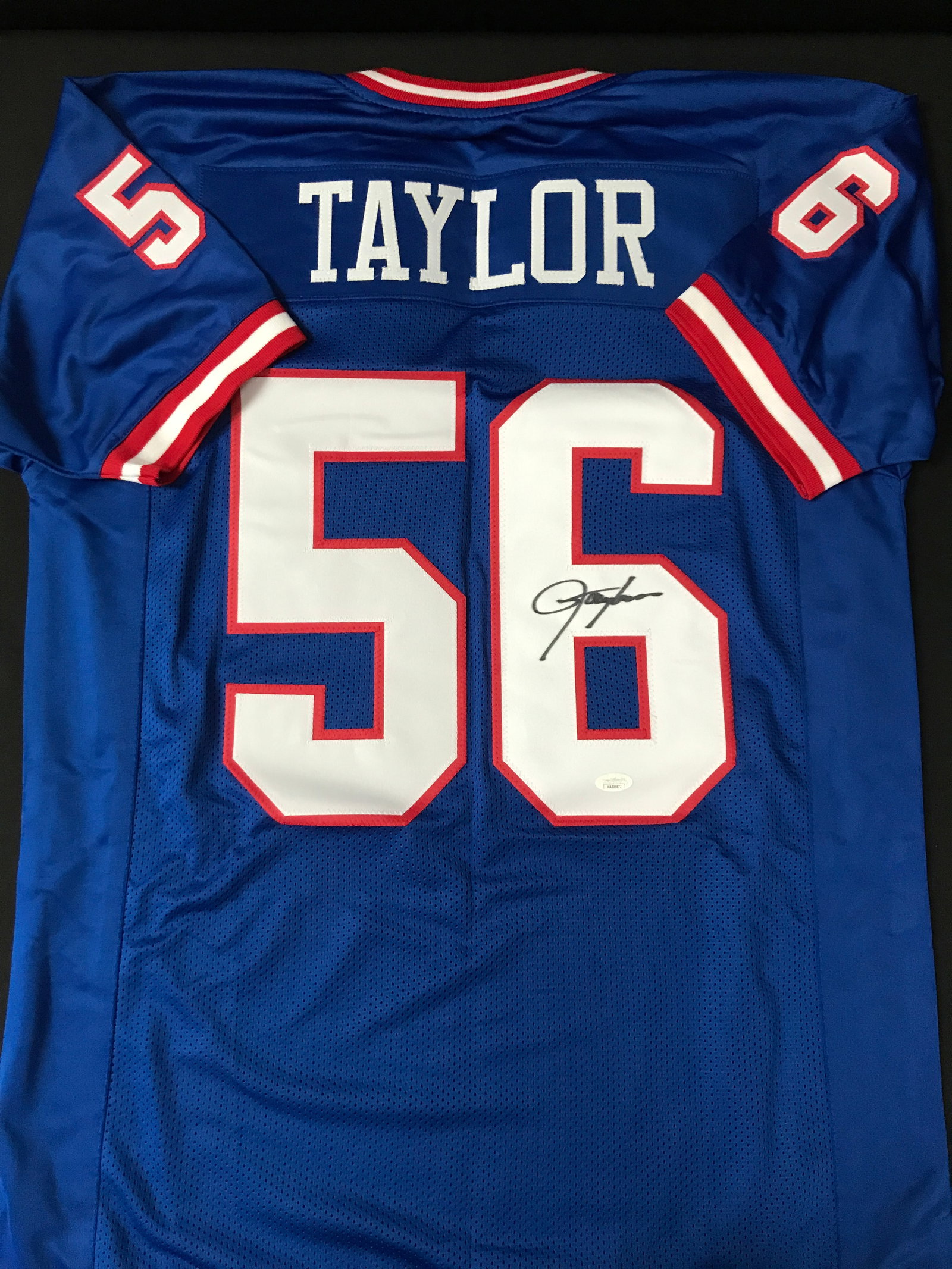 LAWRENCE TAYLOR SIGNED JERSEY - JSA COA: Prices are in Canadian dollars