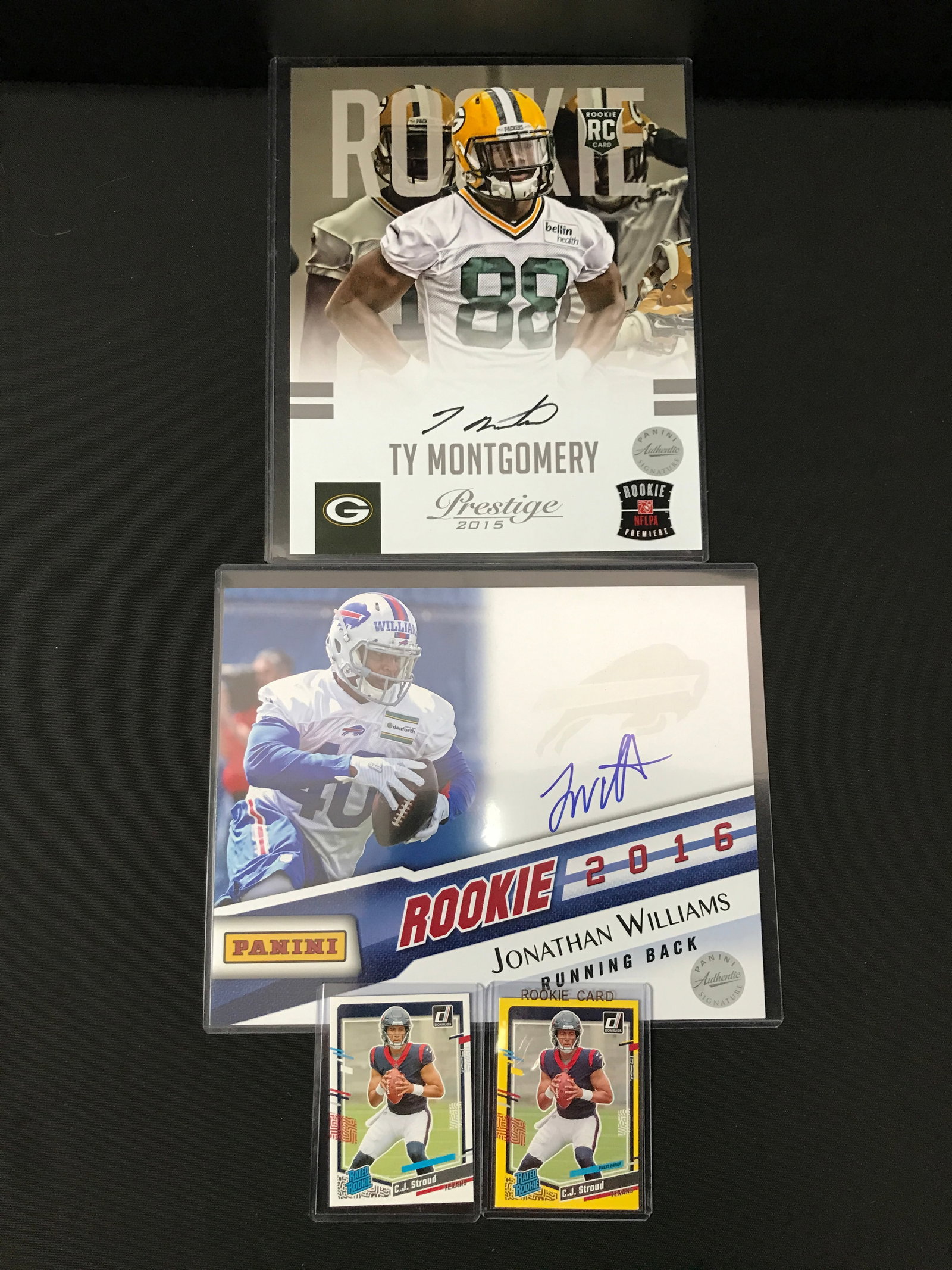 NFL FOOTBALL LOT (2 SIGNED 8 X 10'S 2 CJ STROUD ROOKIE CARDS: Prices are in Canadian dollars