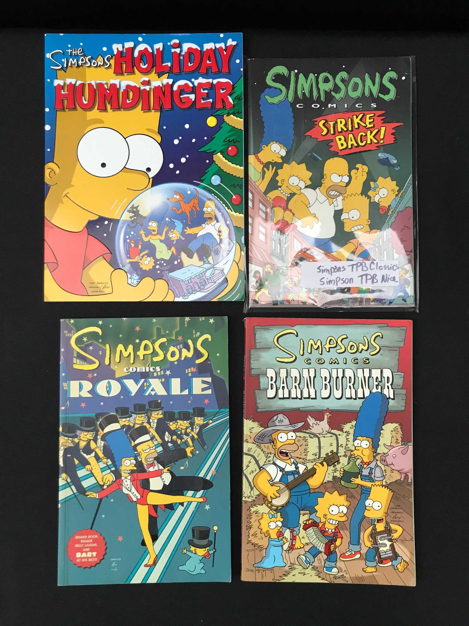 LOT OF 4 SIMPSONS GRAPHIC NOVELS: Prices are in Canadian dollars