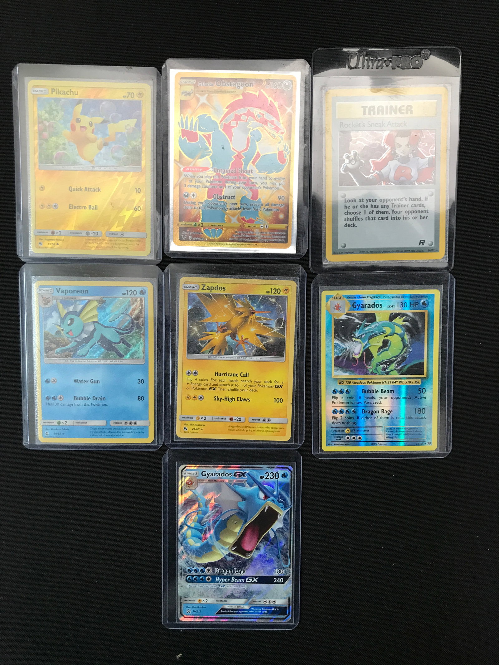 LOT OF 7 POKEMON TCG TRADING CARDS IN INDIVIDUAL SLEEVES (1 of 1)