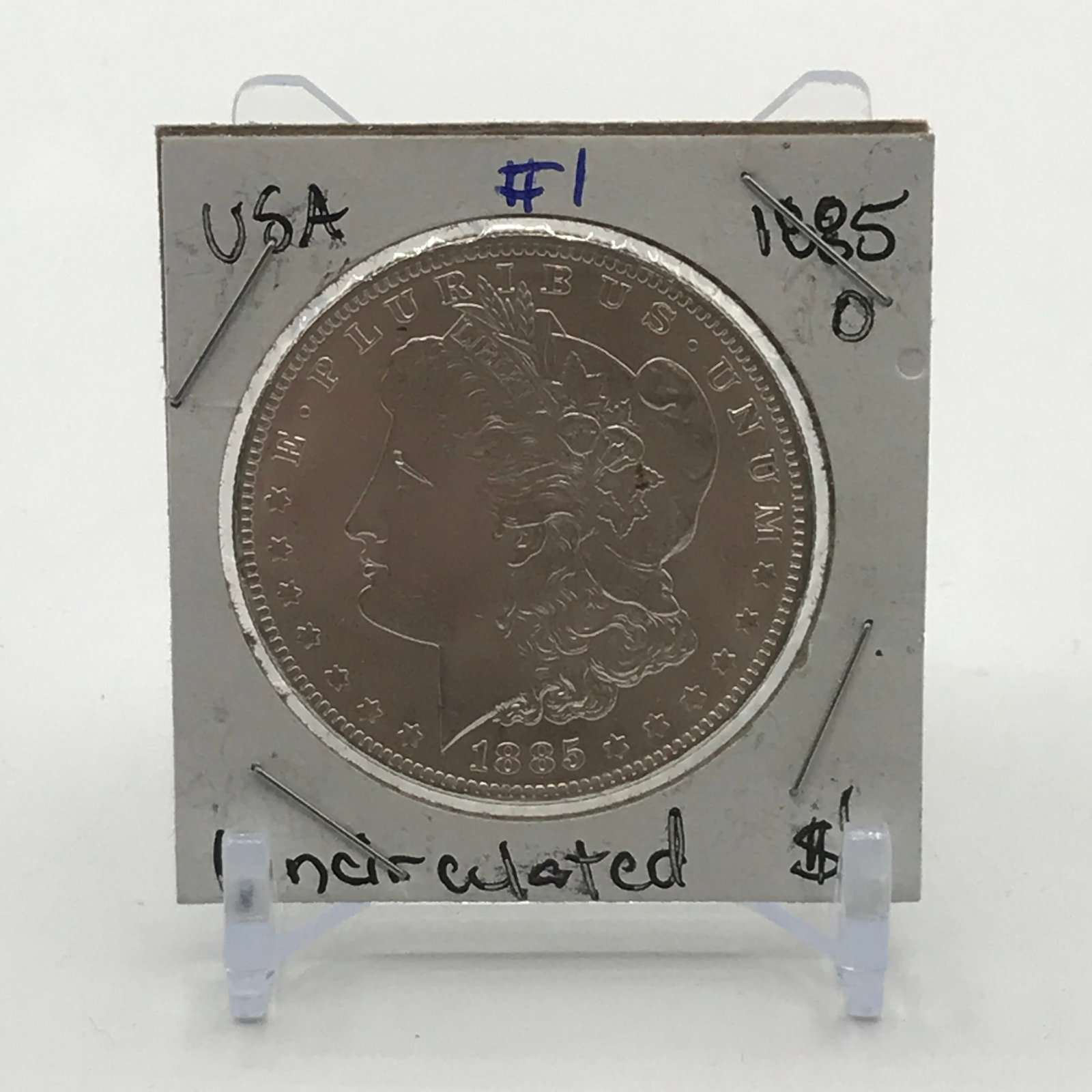 UNCIRCULATED SILVER DOLLAR - MINTED IN 1885 IN NEW ORLEANS: Prices are in Canadian dollars