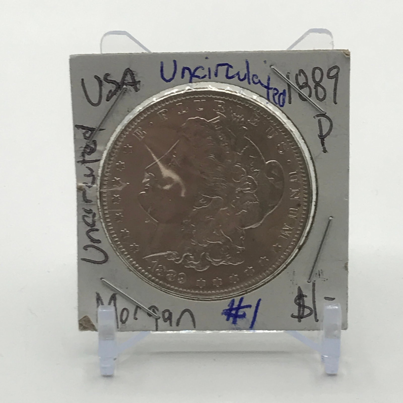 UNCIRCULATED MORGAN SILVER DOLLAR - MINTED IN 1889 IN PHILADELPHIA (1 of 2)