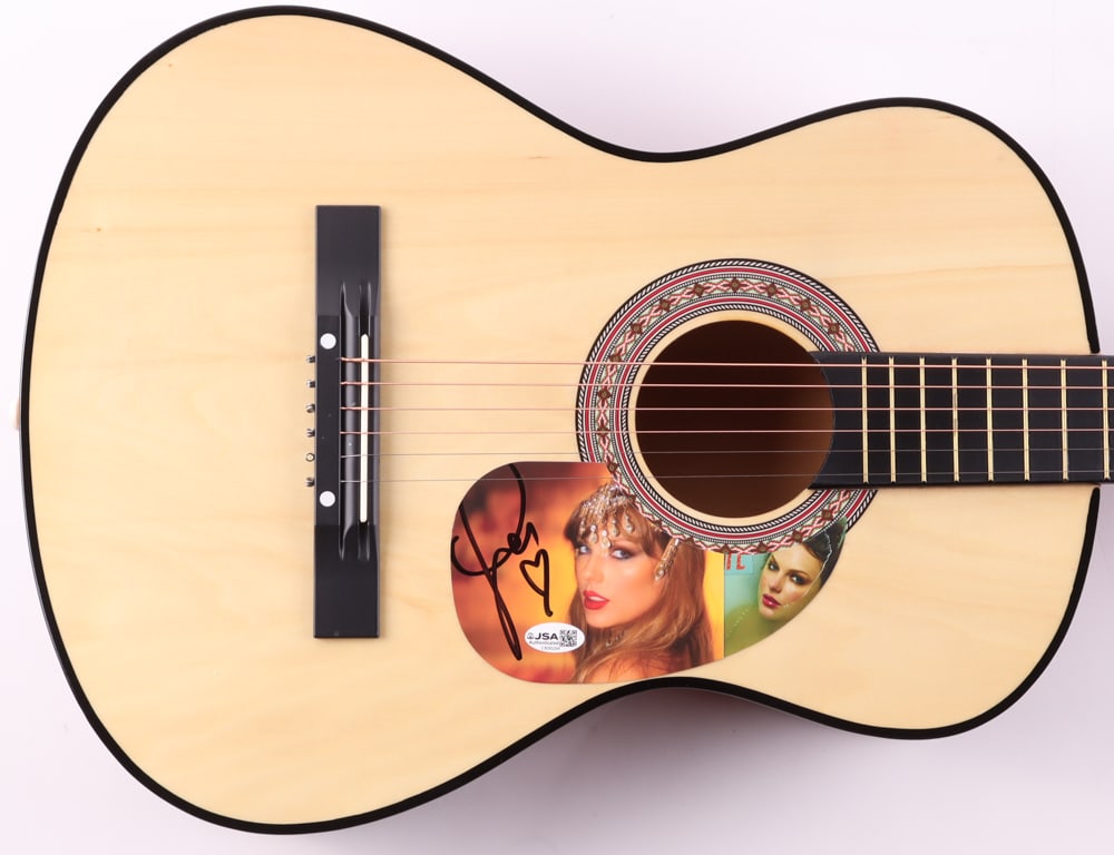 TAYLOR SWIFT SIGNED ACOUSTIC GUITAR - JSA COA: Prices are in Canadian dollars