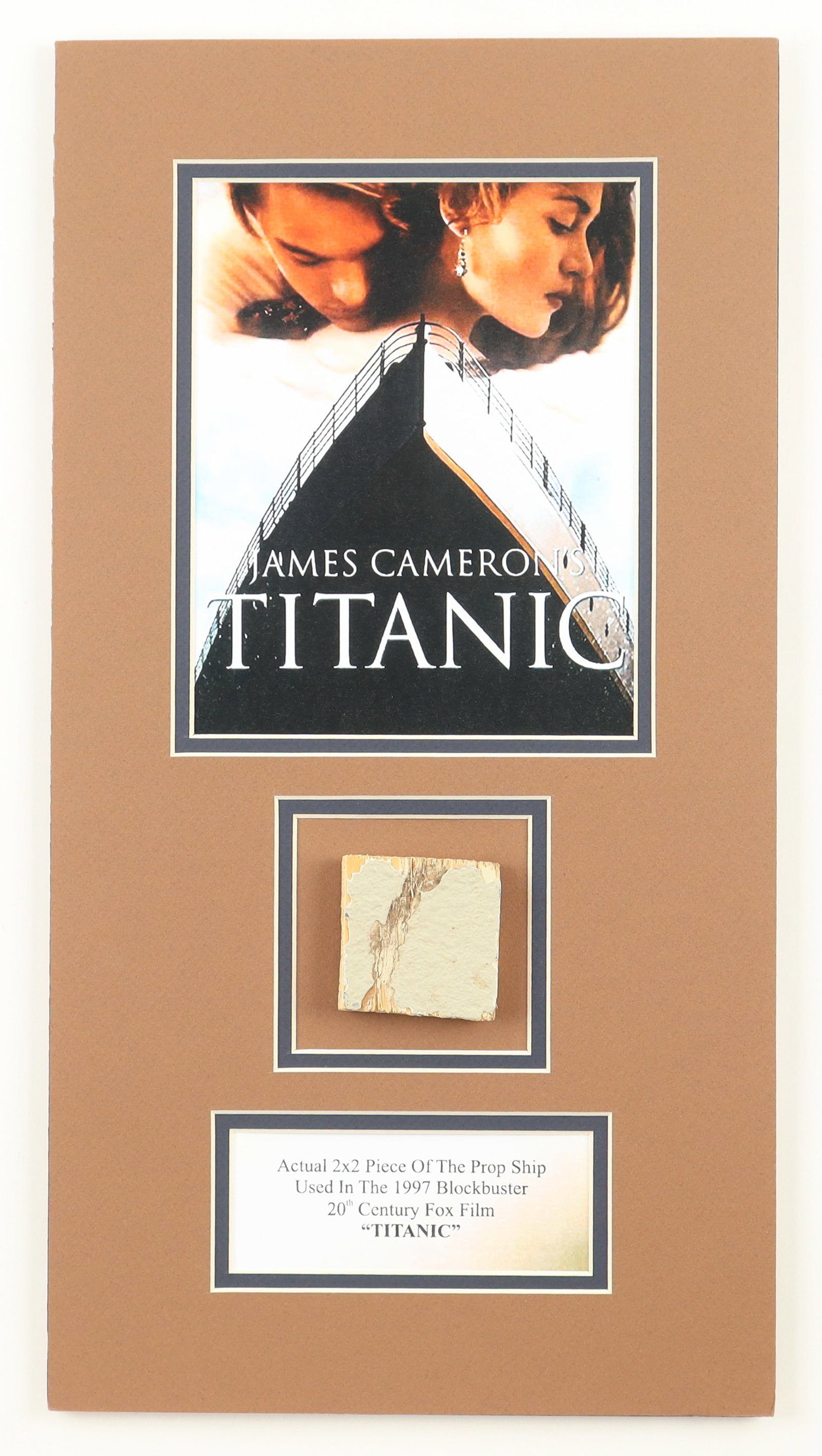 FRAMED TITANIC PRESENTATION PIECE FEATURING 2X2 PIECE OF THE PROP SHIP USED IN FILMING: Prices are in Canadian dollars