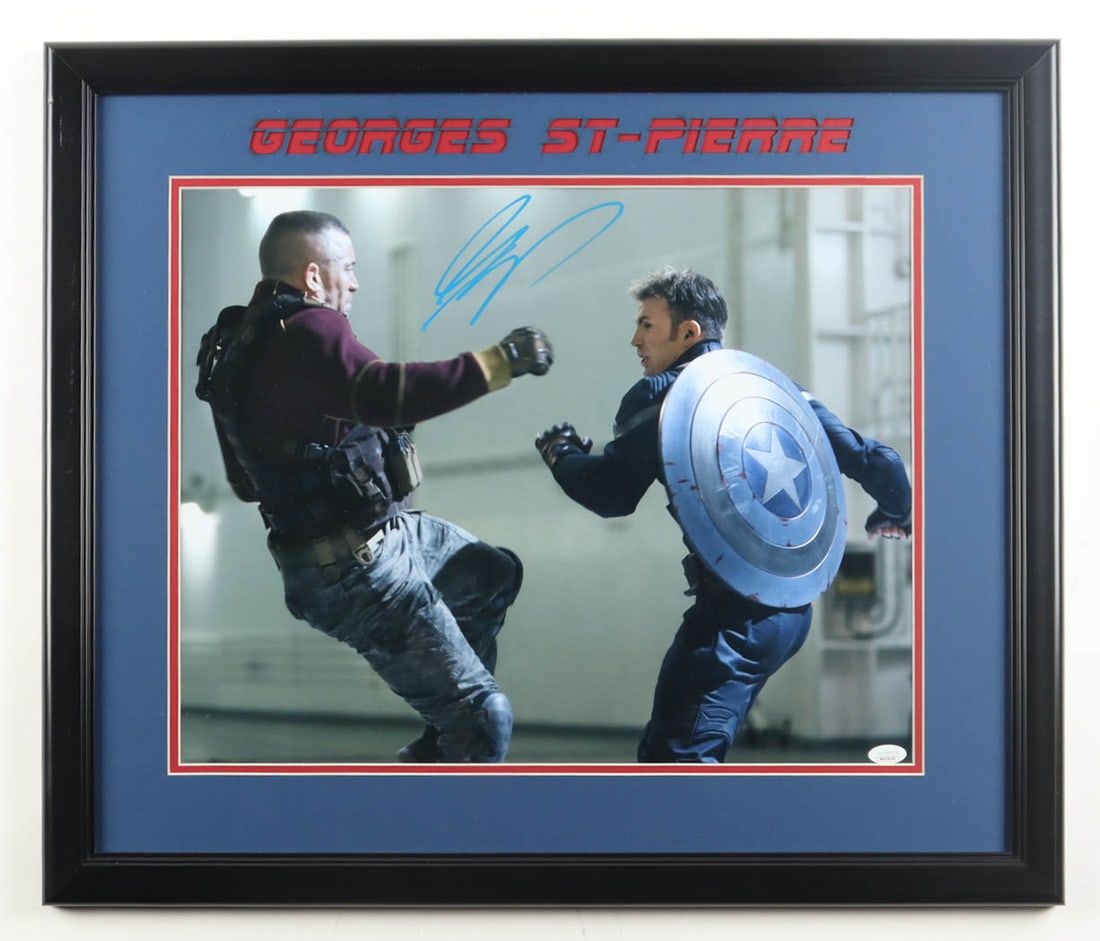 GEORGES ST PIERRE SIGNED AND FRAMED CAPTAIN AMERICA 16 X 20 - JSA COA: Prices are in Canadian dollars