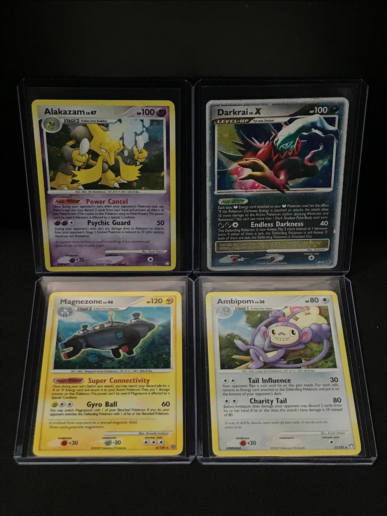 LOT OF 4 POKEMON TCG TRADING CARDS IN INDIVIDUAL SLEEVES: Prices are in Canadian dollars