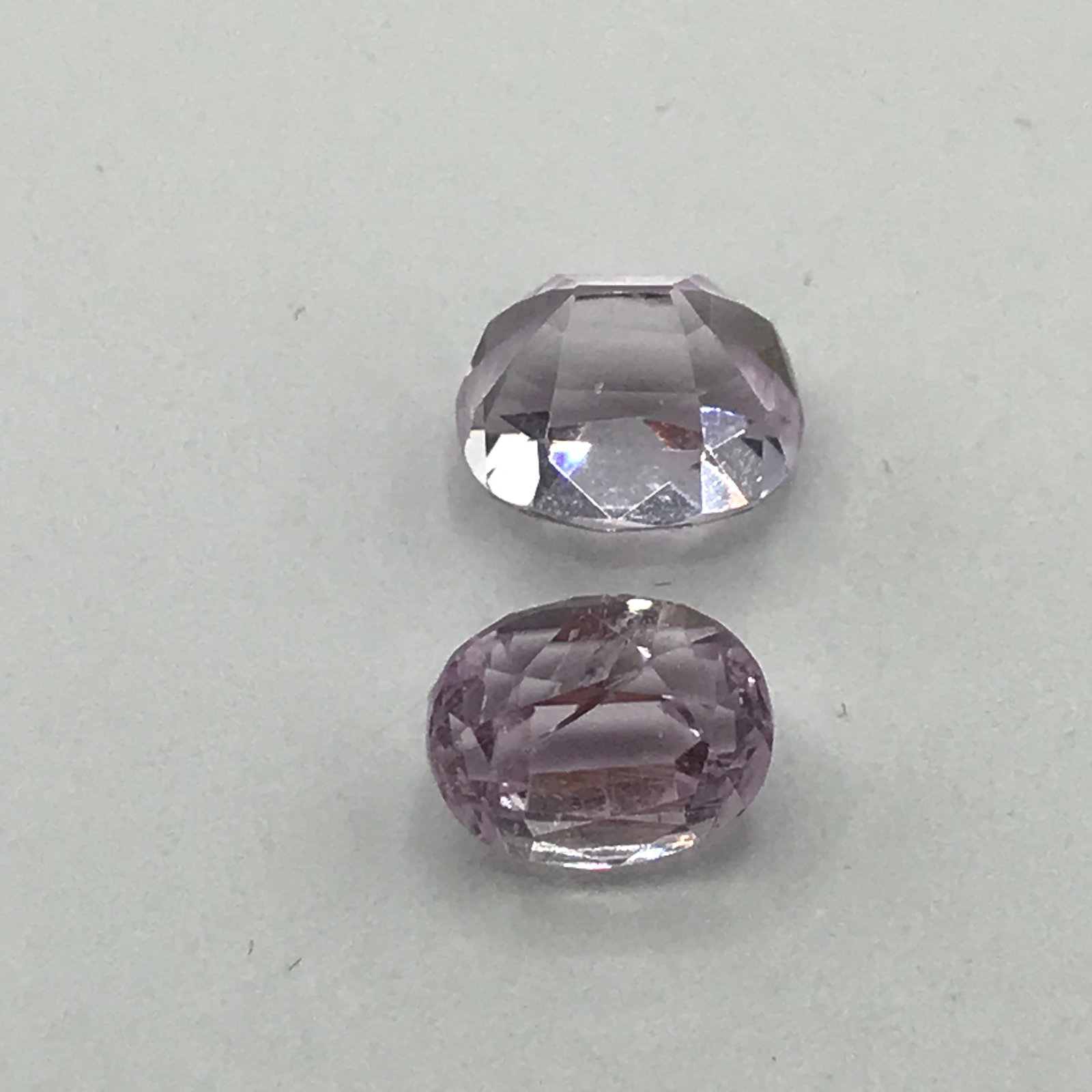 PAIR OF PINK KUNZITES TOTAL WEIGHT 10.89CT PURPLISH/PINK WITH GOOD CUT - UH APPRAISAL $5,350: Prices are in Canadian dollars