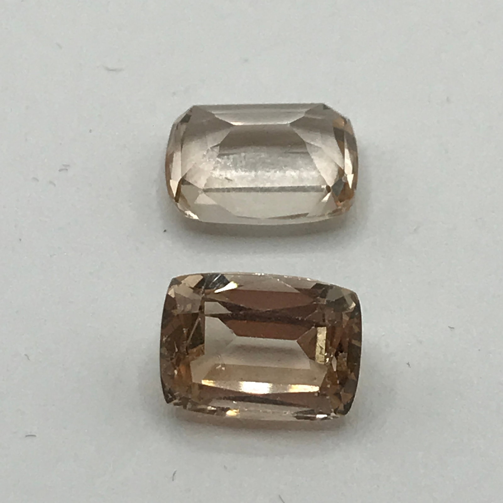 LOT OF 2 IMPERIAL TOPAZES 12.25CT TOTAL WEIGHT BROWNISH PEACH GOOD CUT - UH APPRAISAL $7,500: Prices are in Canadian dollars