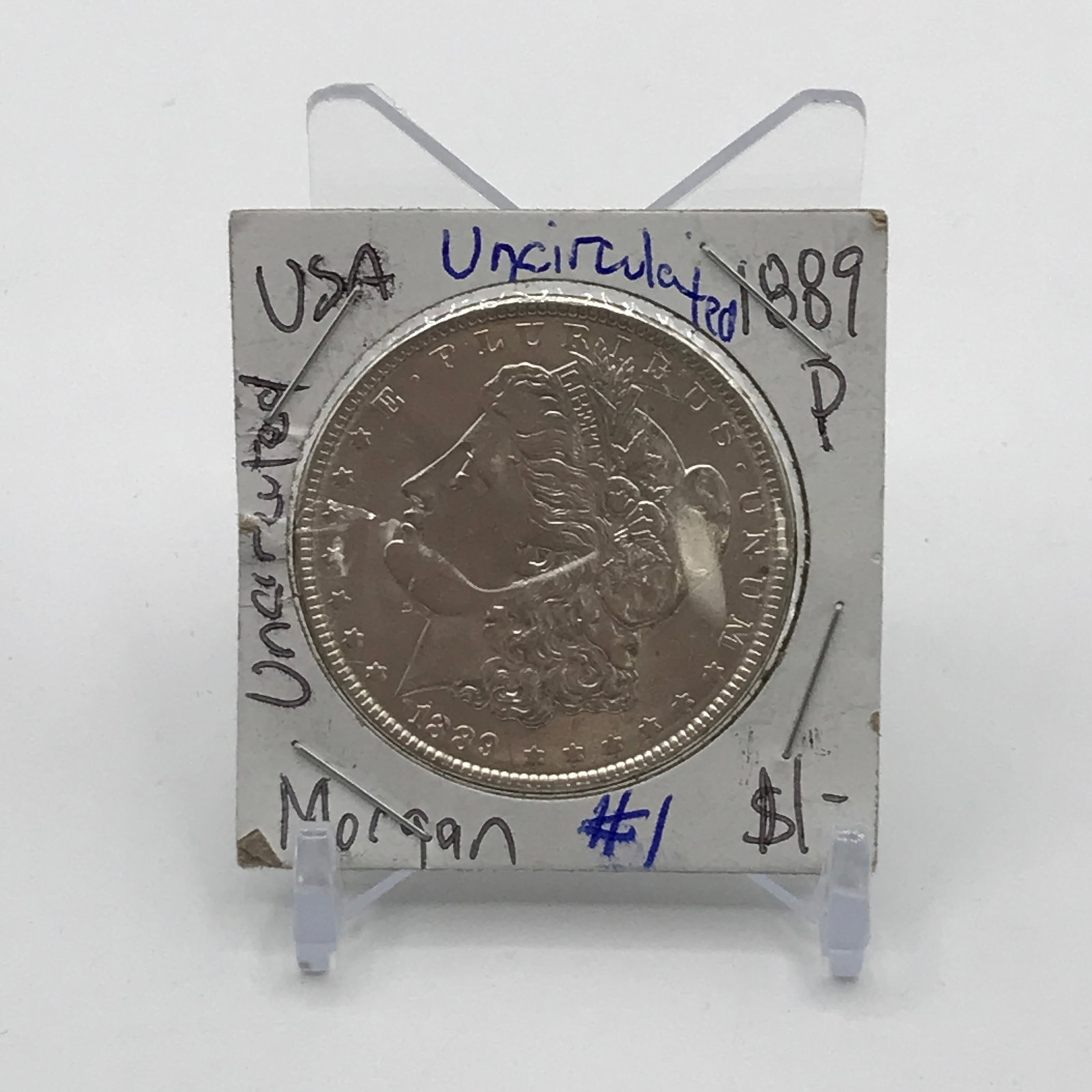 UNCIRCULATED MORGAN SILVER DOLLAR - MINTED IN 1889 IN PHILADELPHIA (1 of 2)