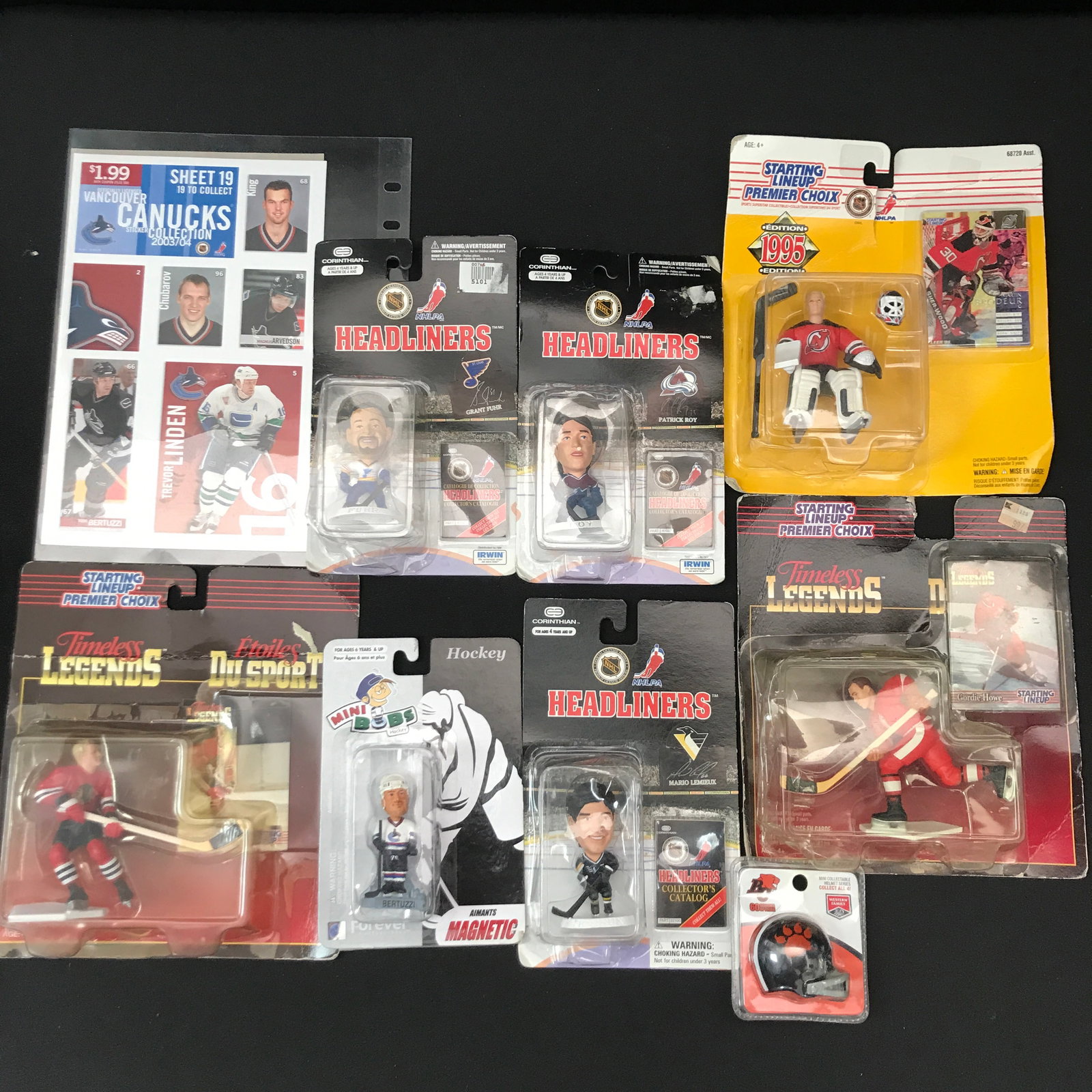 LOT OF SPORTS MEMORABILIA INCLUDING VANCOUVER CANUCKS STICKERS 2003-4: Prices are in Canadian dollars