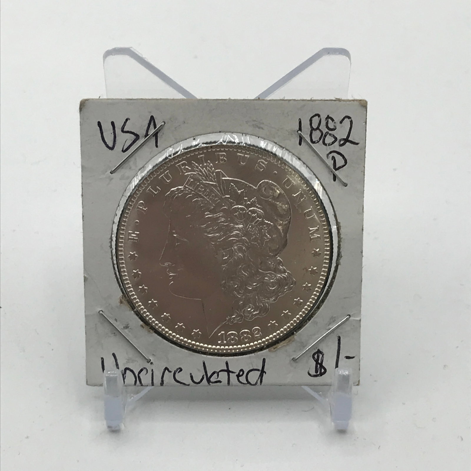 UNCIRCULATED SILVER DOLLAR - MINTED 1882 IN PHILADELPHIA: Prices are in Canadian dollars