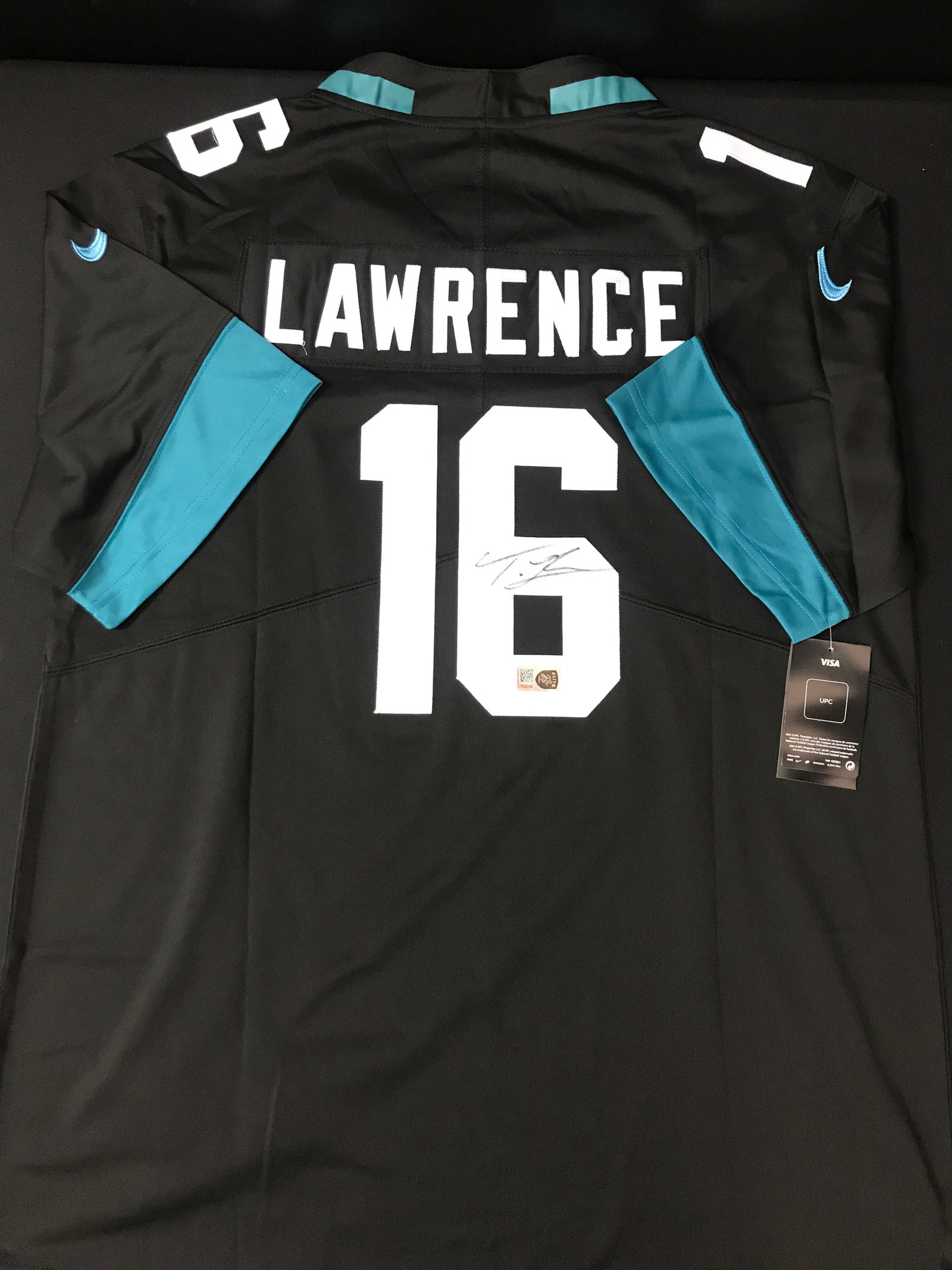 TREVOR LAWRENCE SIGNED JACKSONVILLE JAGUARS CUSTOM JERSEY - ELITE SPORTS COA: Prices are in Canadian dollars