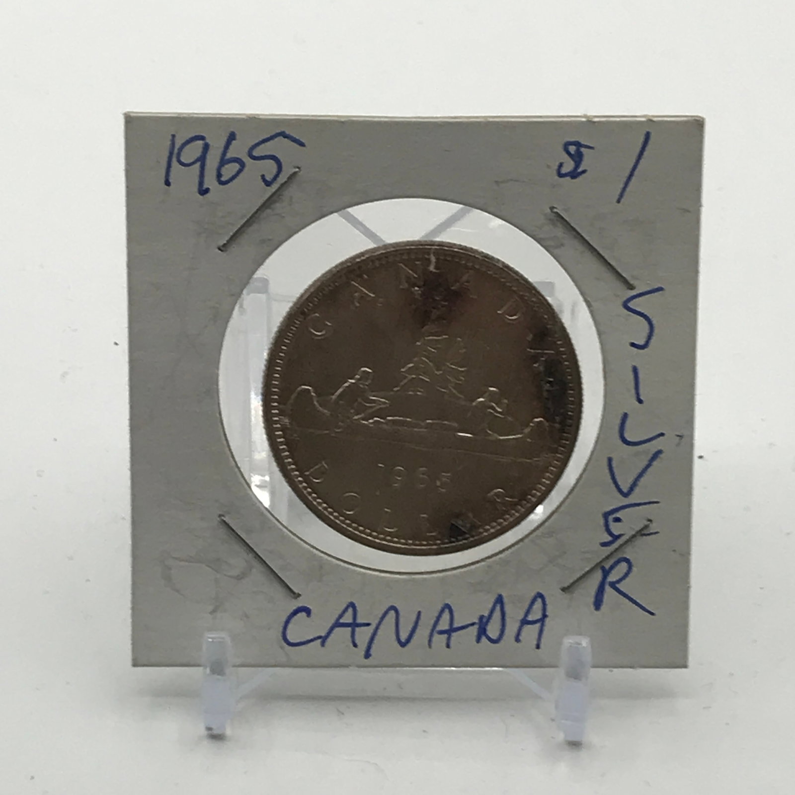 CANADIAN SILVER DOLLAR - MINTED IN 1965 (1 of 2)