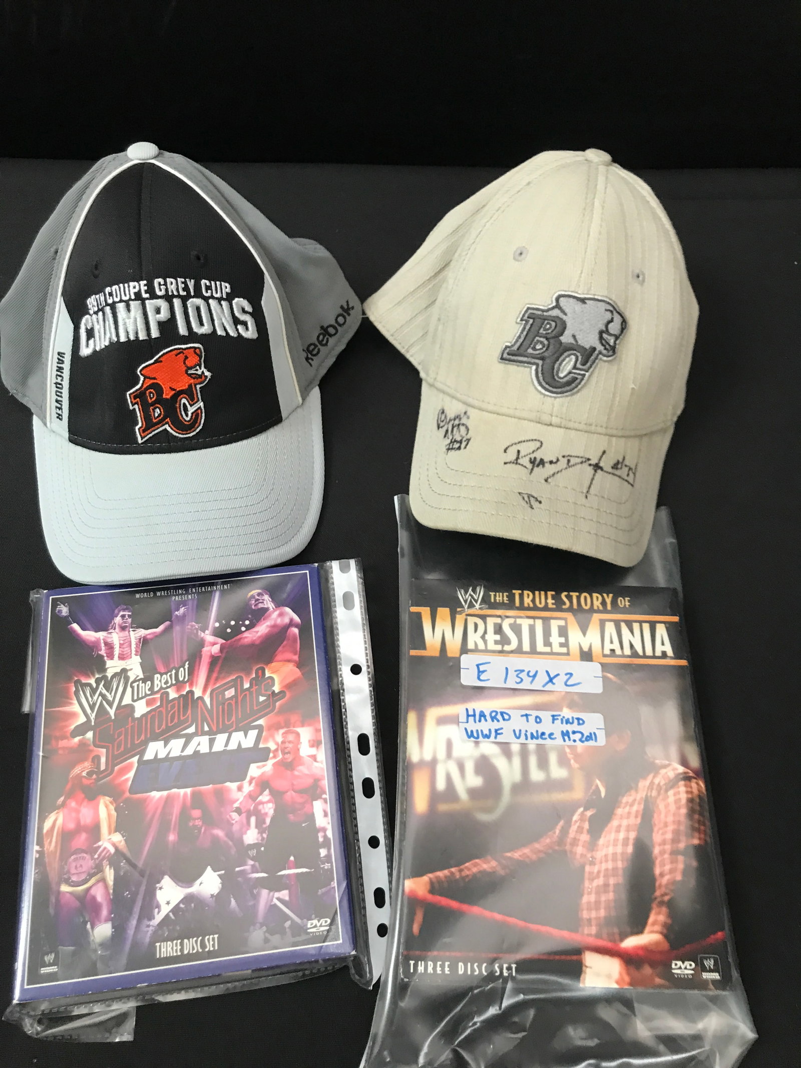 LOT OF 2 DVD SETS AND 2 HATS - BC LIONS HAT SIGNED: Prices are in Canadian Dollars