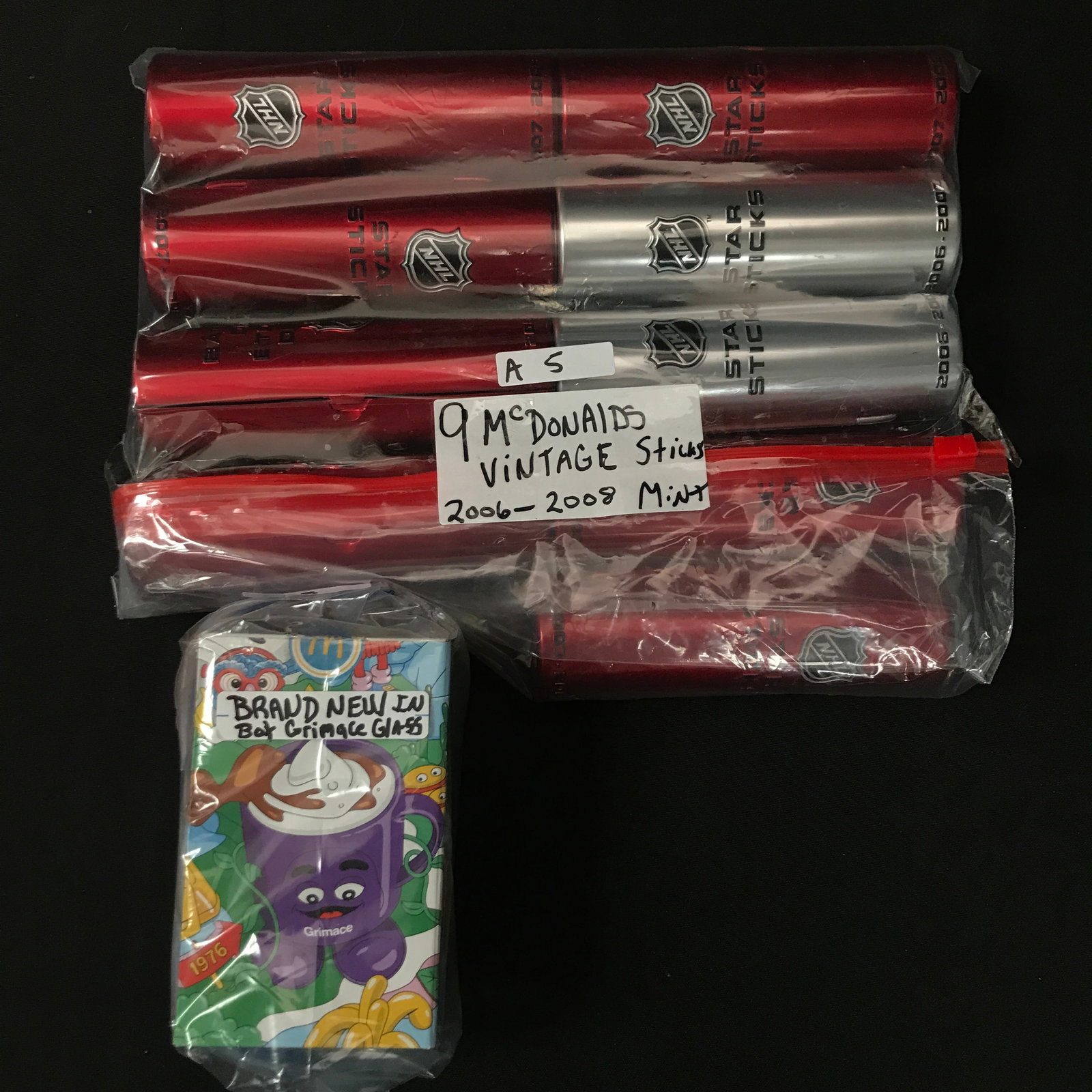 LOT OF 9 2006-08 MCDONALDS STICKS & BRAND NEW IN BAG GRIMACE GLASS: Prices are in Canadian dollars