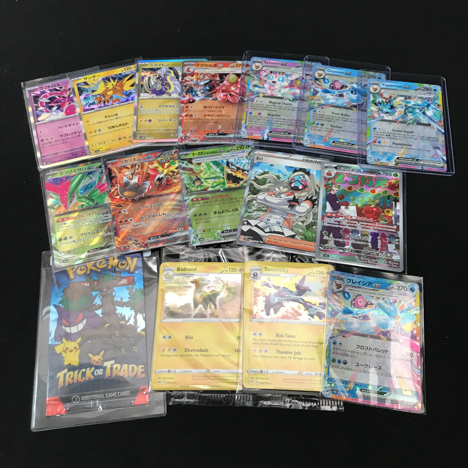 LOT OF INDIVIDUAL POKEMON TCG TRADING CARDS IN INDIVIDUAL SLEEVES (1 of 1)