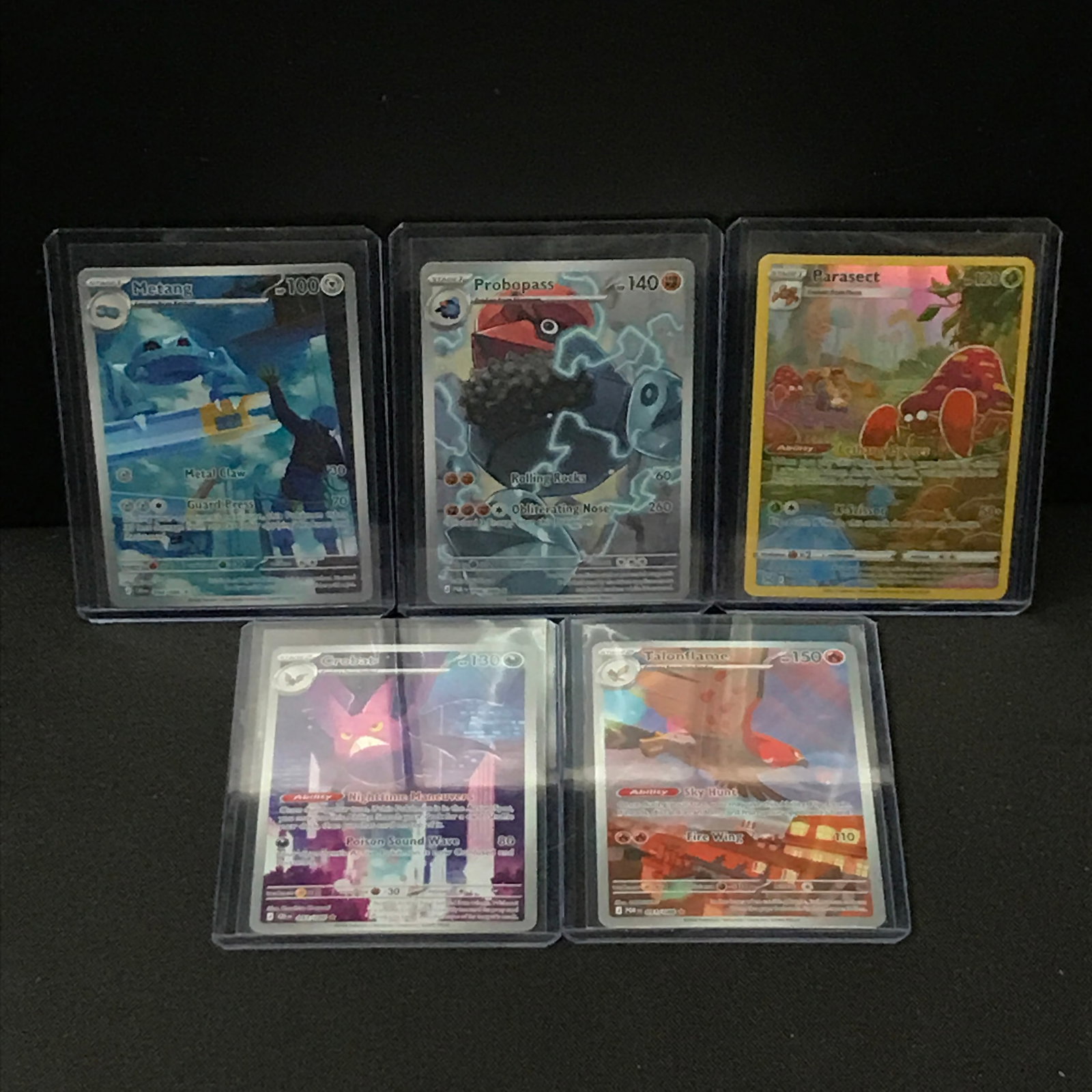 LOT OF 5 POKEMON TCG TRADING CARDS IN INDIVIDUAL SLEEVES: Prices are in Canadian dollars