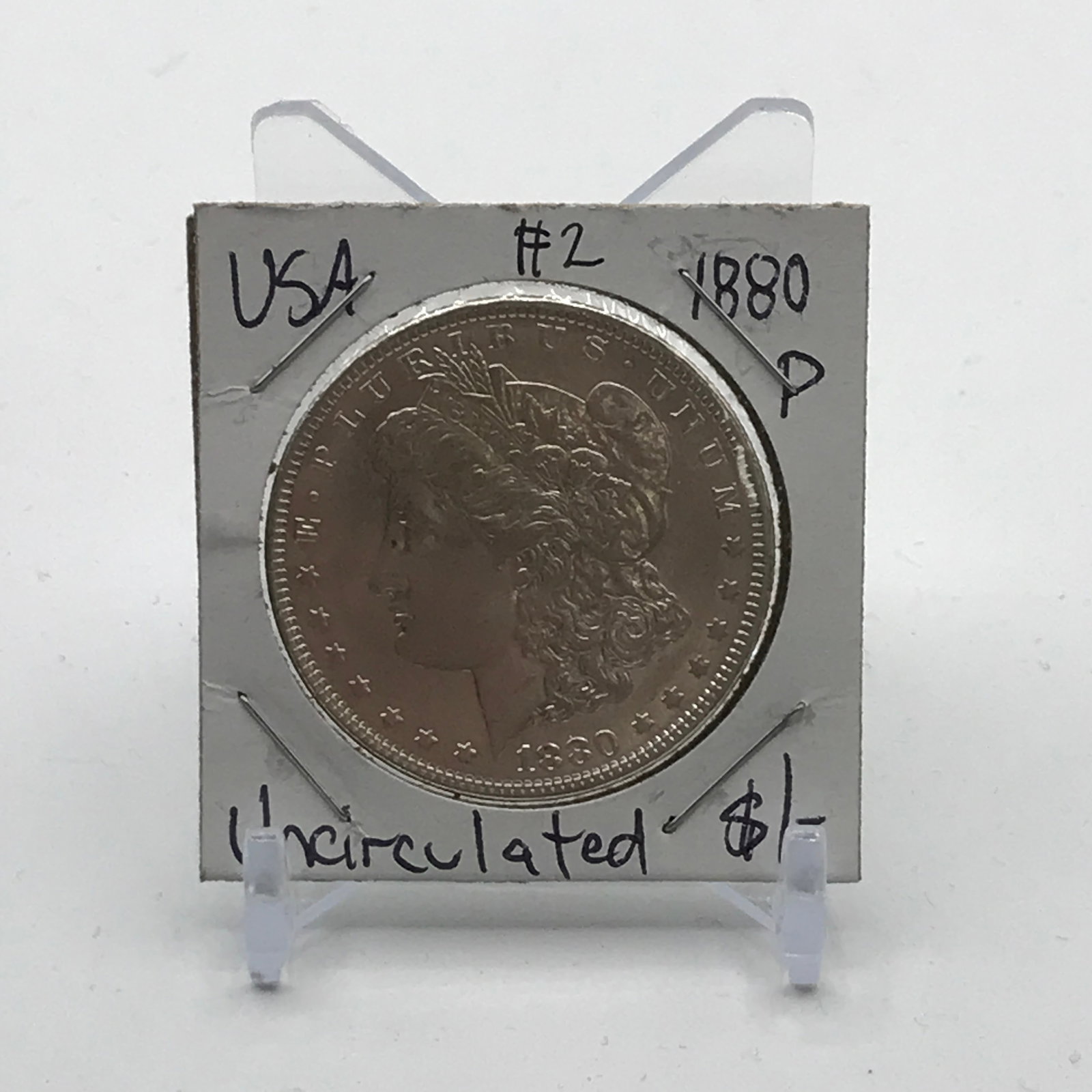 UNCIRCULATED SILVER DOLLAR - MINTED IN 1880 IN PHILADELPHIA: Prices are in Canadian dollars