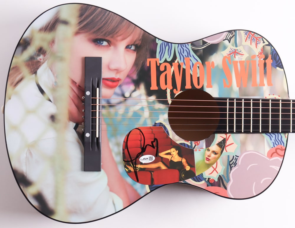 TAYLOR SWIFT SIGNED ACOUSTIC GUITAR - JSA COA: Prices are in Canadian dollars