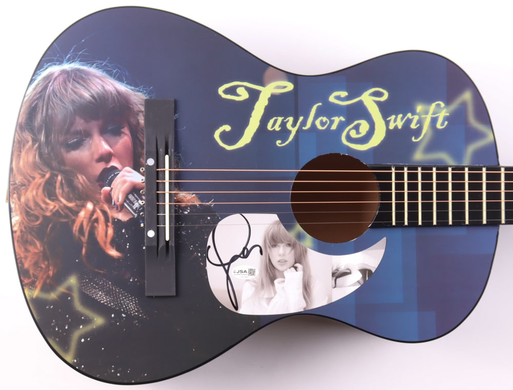 TAYLOR SWIFT SIGNED ACOUSTIC GUITAR - JSA COA: Prices are in Canadian dollars
