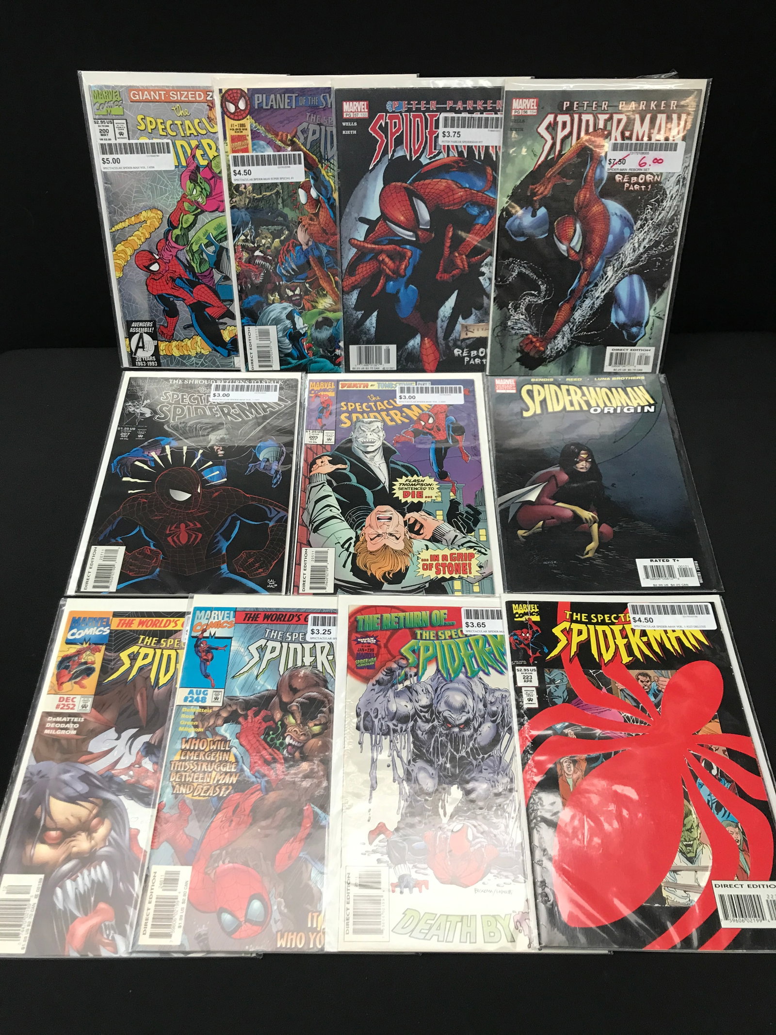 LOT OF 11 SPIDERMAN COMICS - MARVEL COMICS: Prices are in Canadian dollars